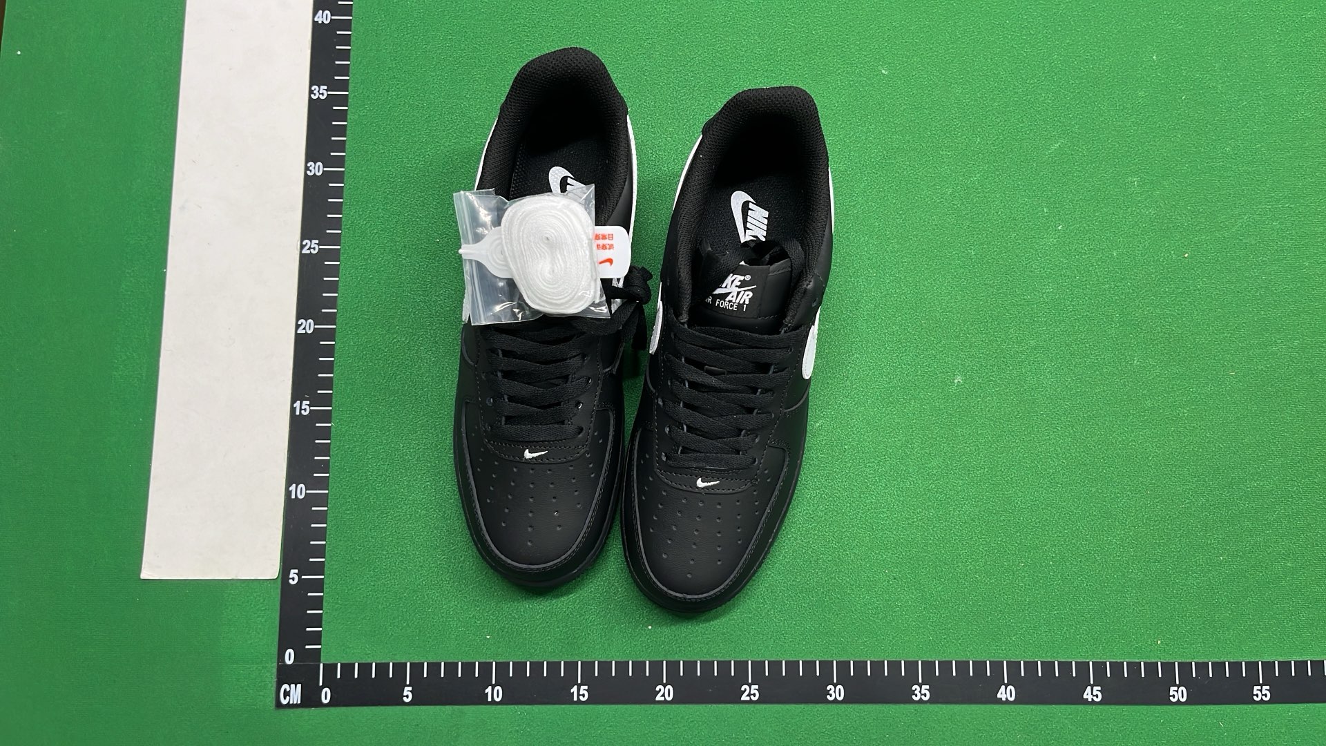 Nike Air Force 1 Black Gold Swoosh Low Top Sneakers