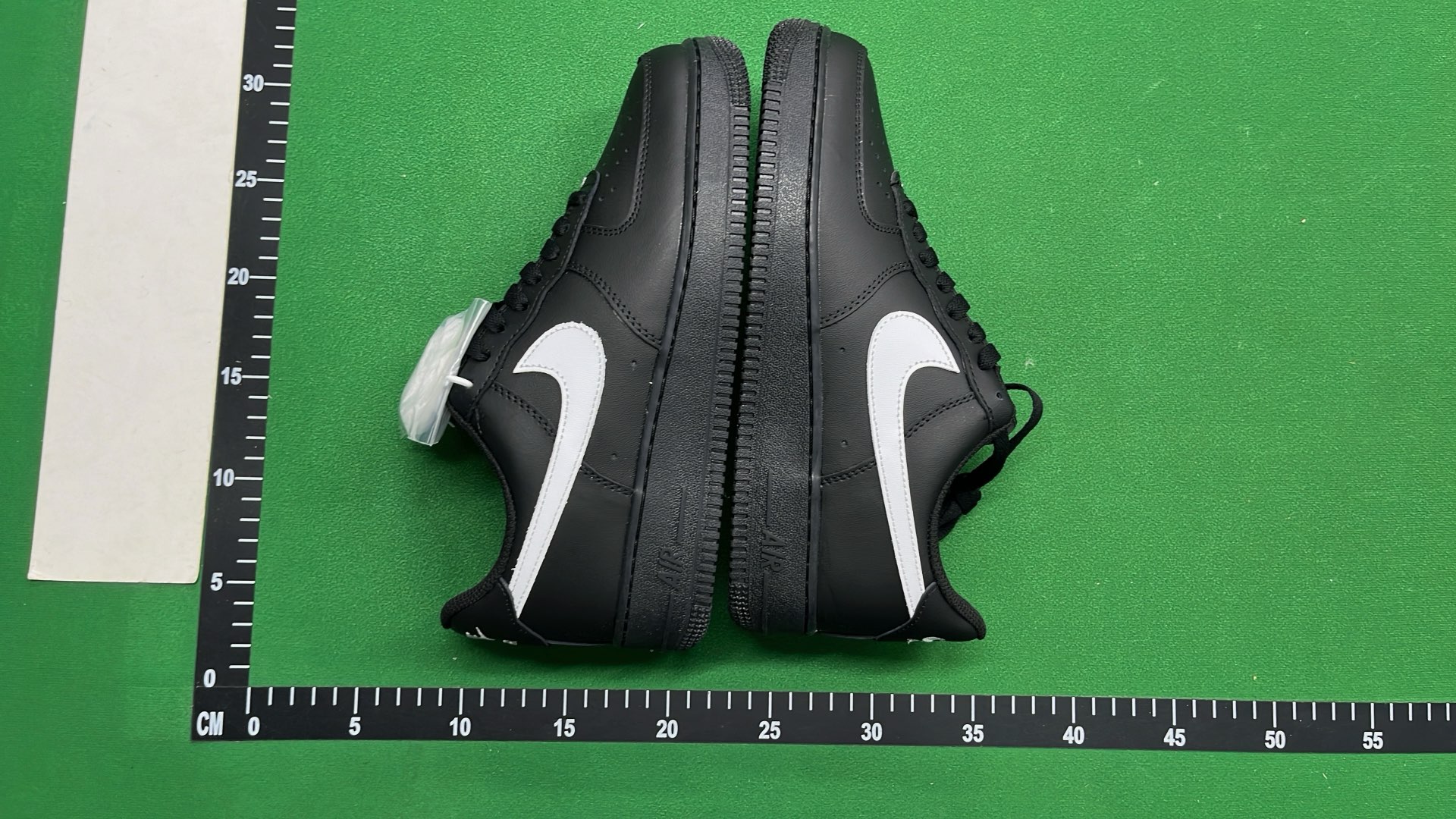 Nike Air Force 1 Black Gold Swoosh Low Top Sneakers