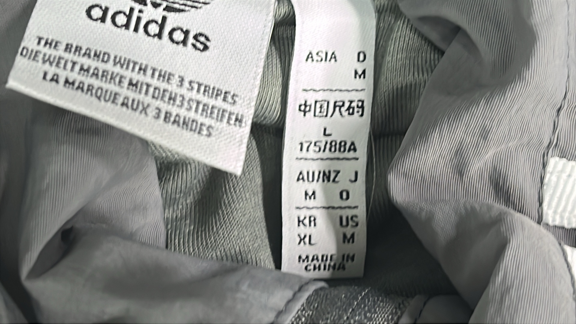 Adidas Black Track Jacket with White Stripes