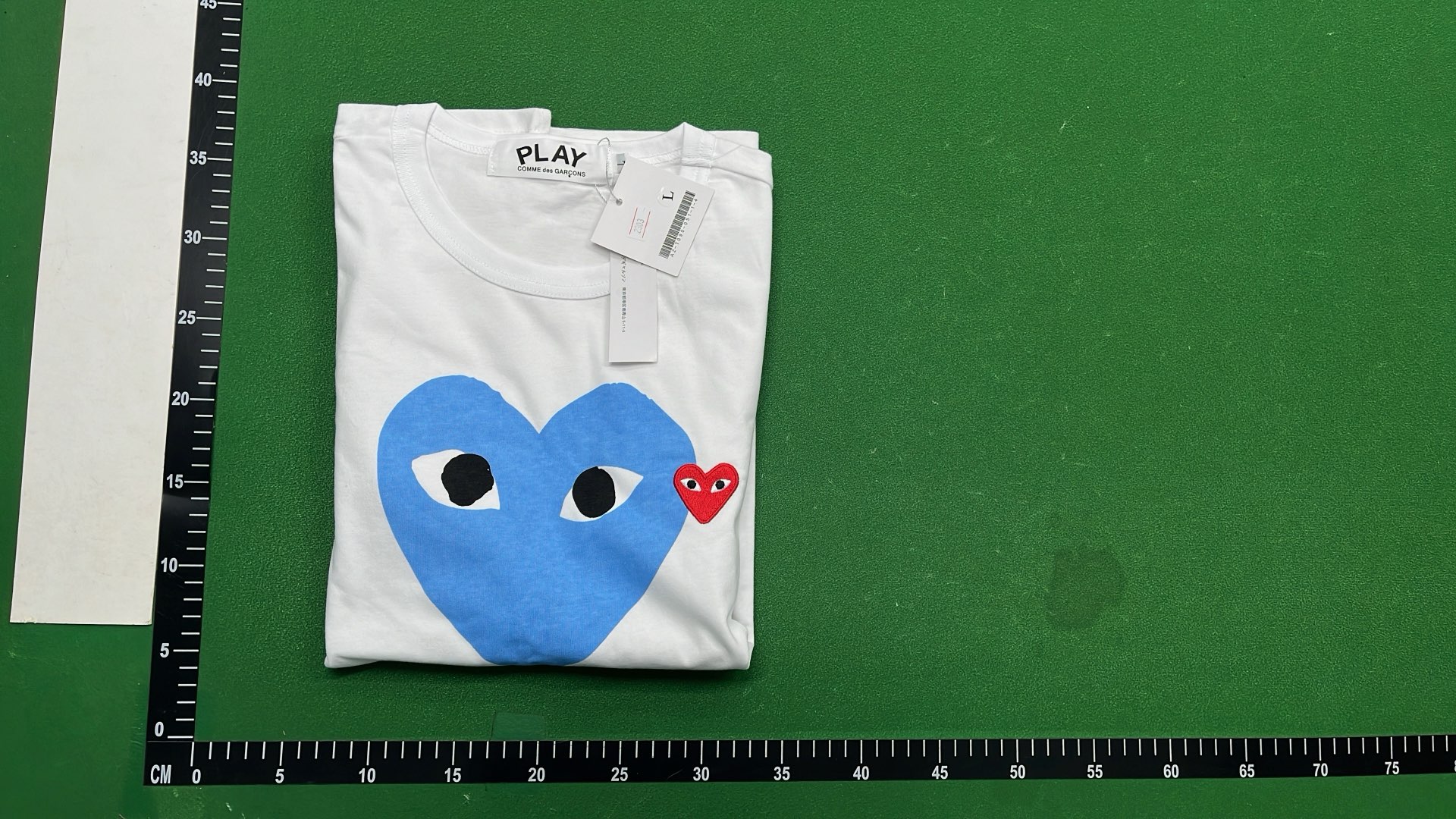 White T-Shirt with Pink Heart and Eyes Graphic
