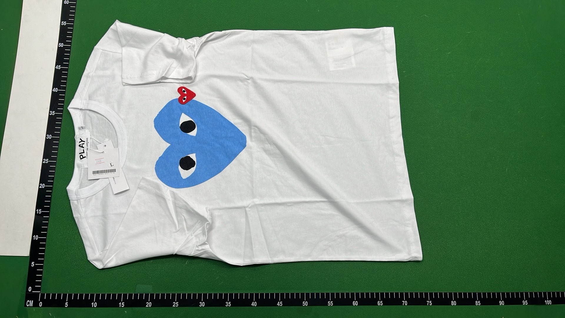 White T-Shirt with Pink Heart and Eyes Graphic