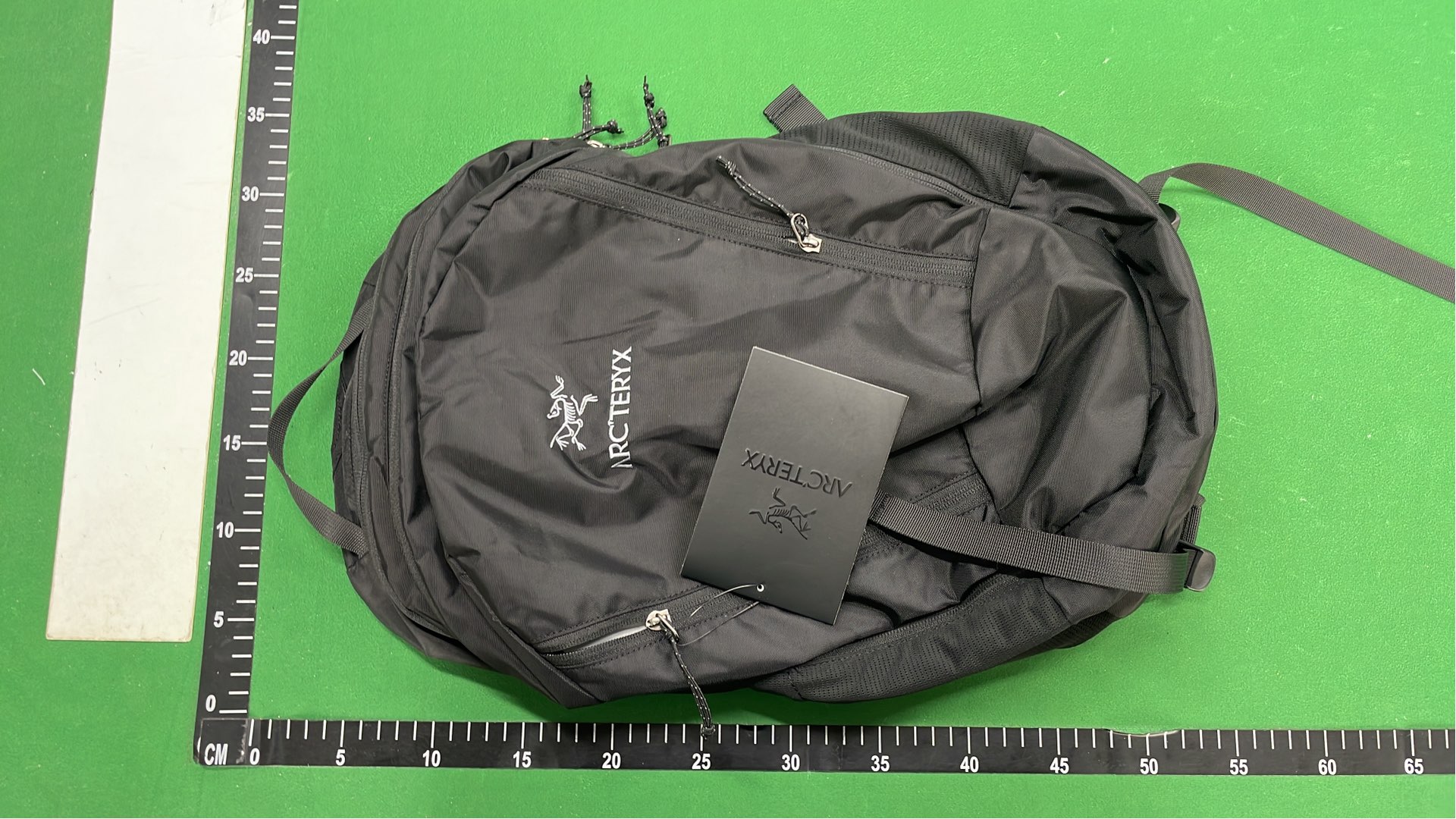 Arc'teryx Black Backpack with Yellow Logo