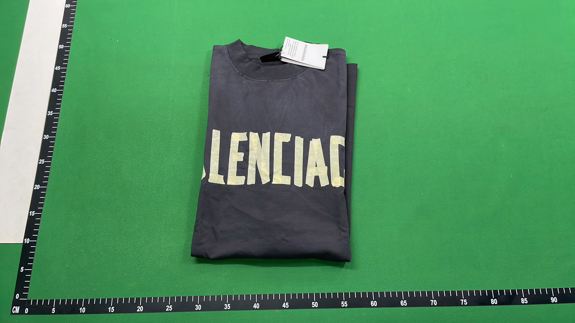 Black T-Shirt with Gold Text Design