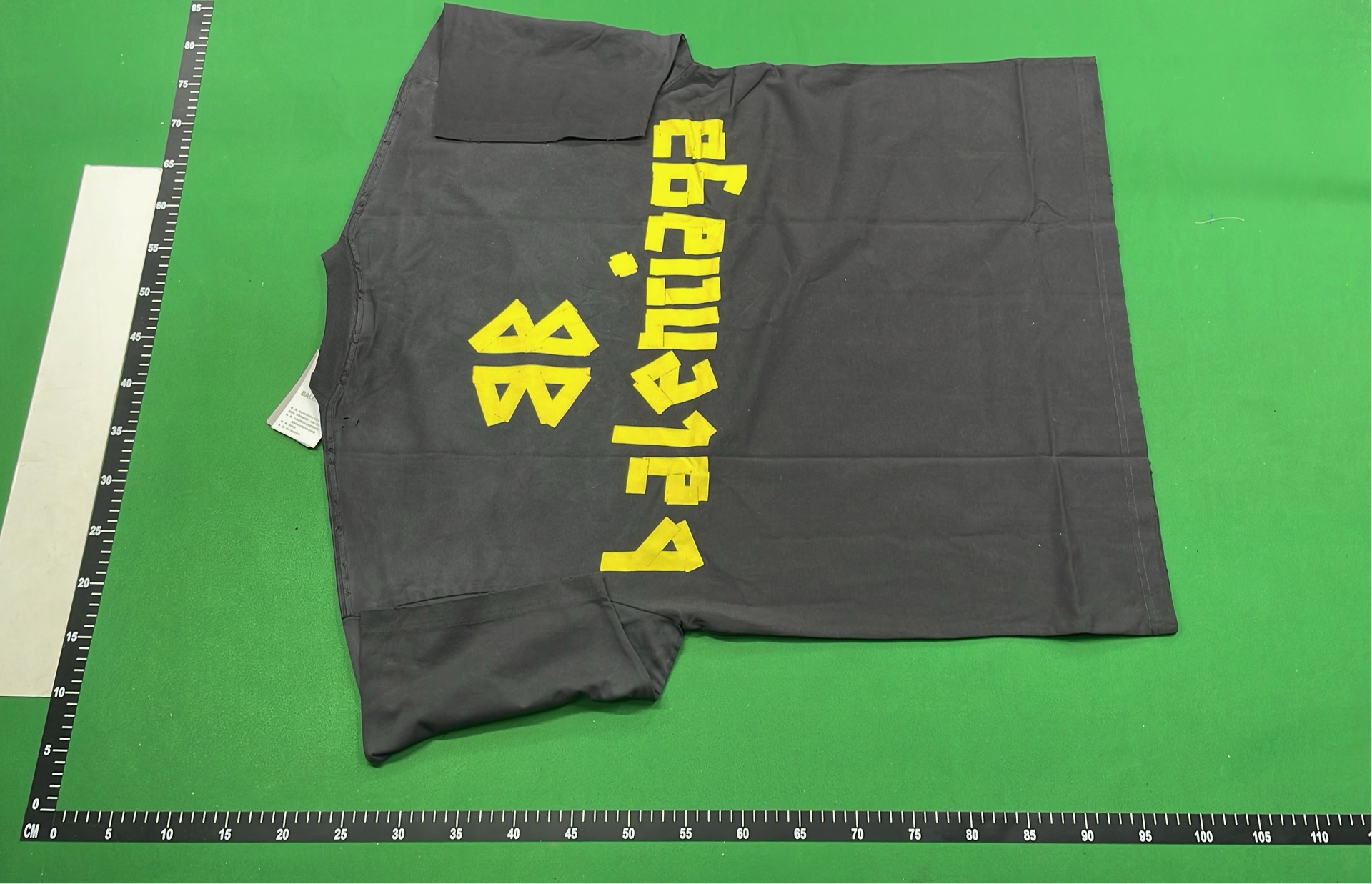Black T-Shirt with Gold Text Design