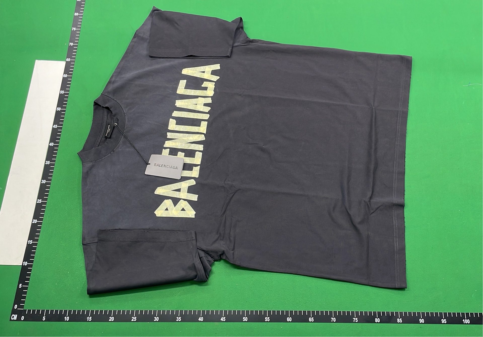 Black T-Shirt with Gold Text Design