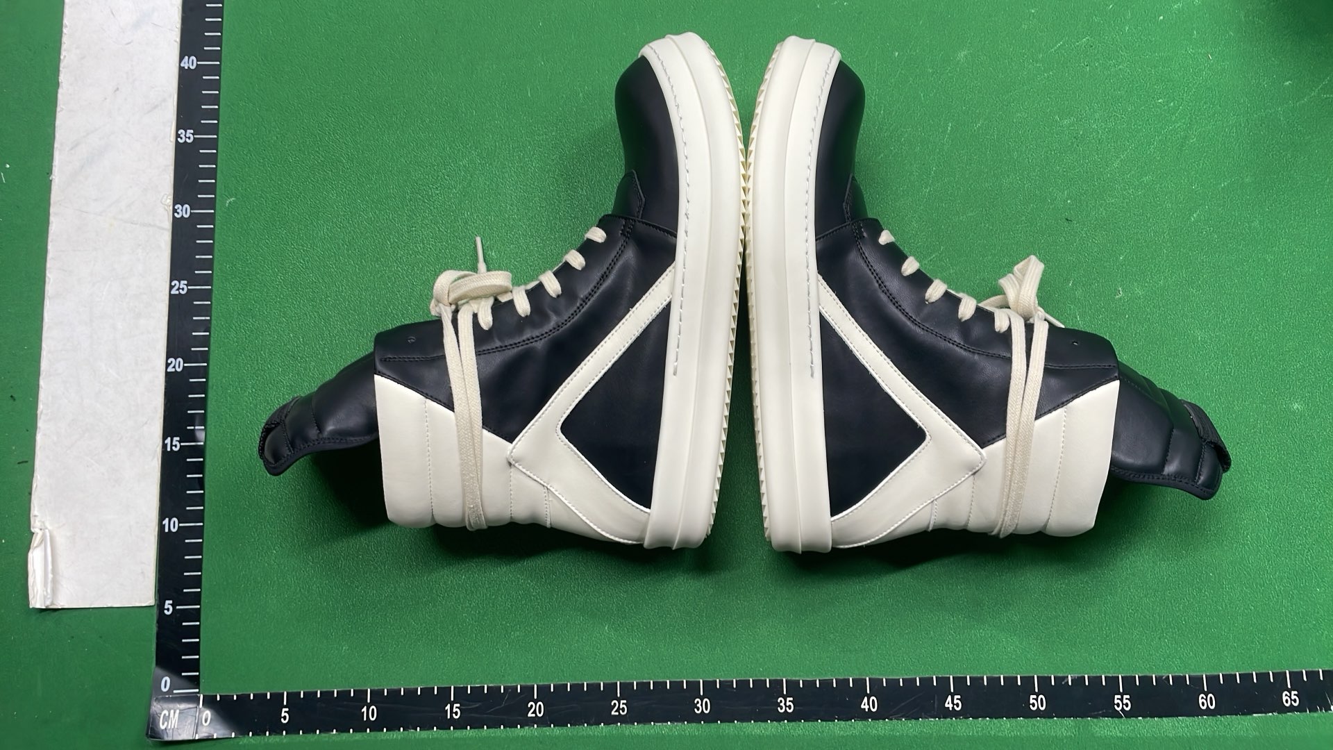 Black High-Top Leather Sneakers with White Toe and Laces