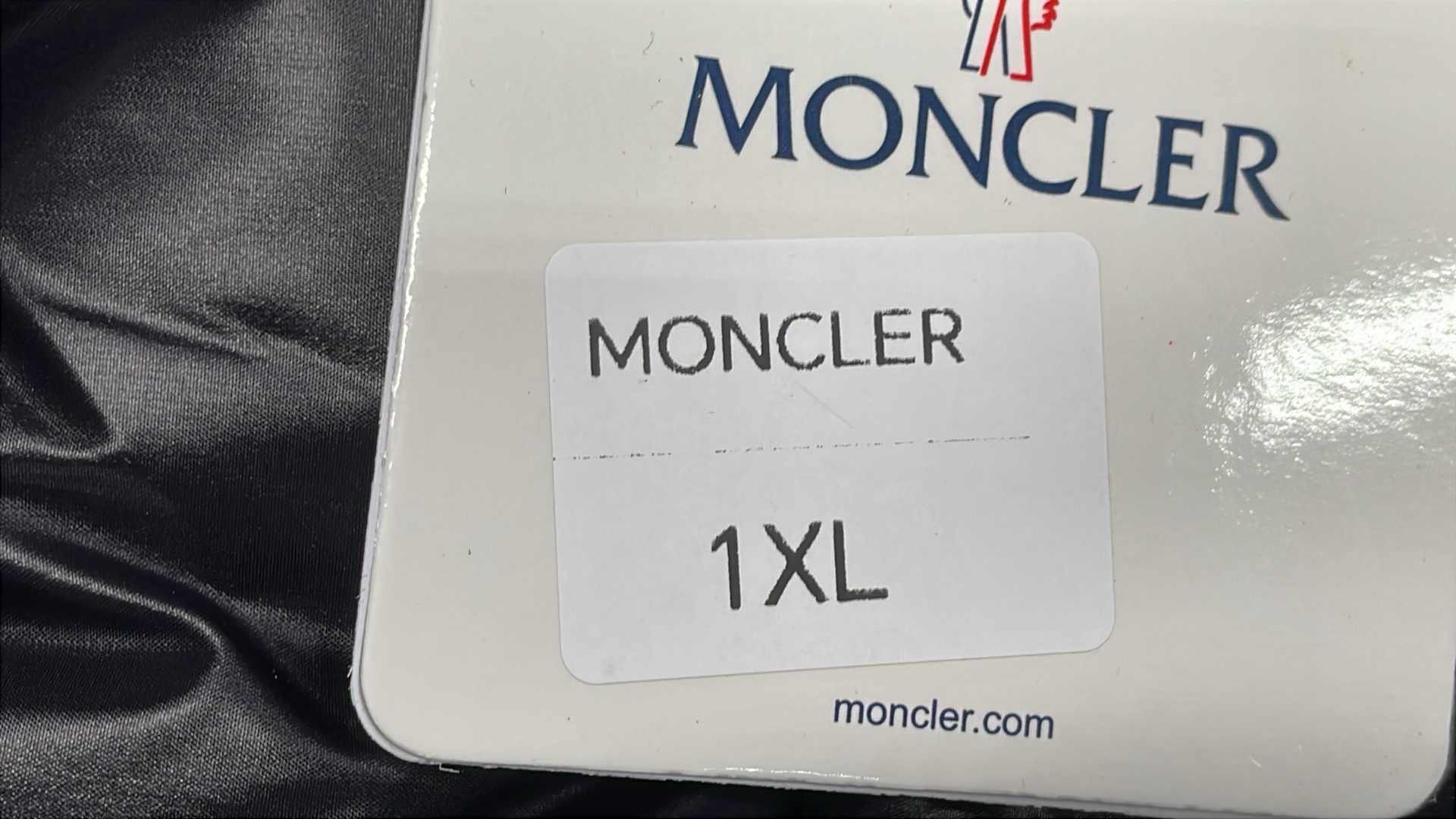 Black Moncler Down Jacket with Hood and Zip Closure