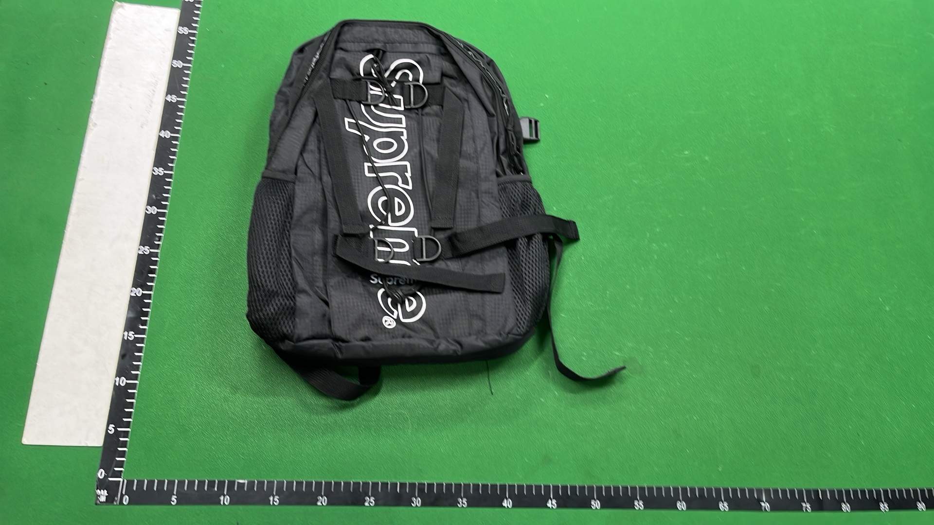 Supreme Backpack in Red Purple Yellow Black