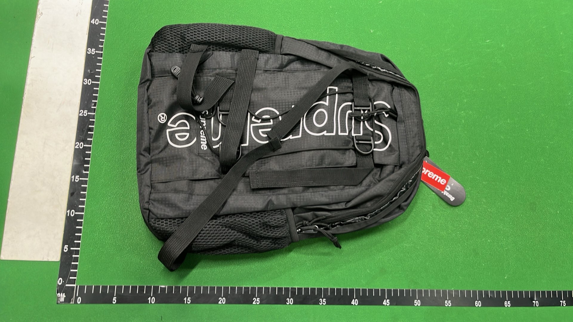 Supreme Backpack in Red Purple Yellow Black