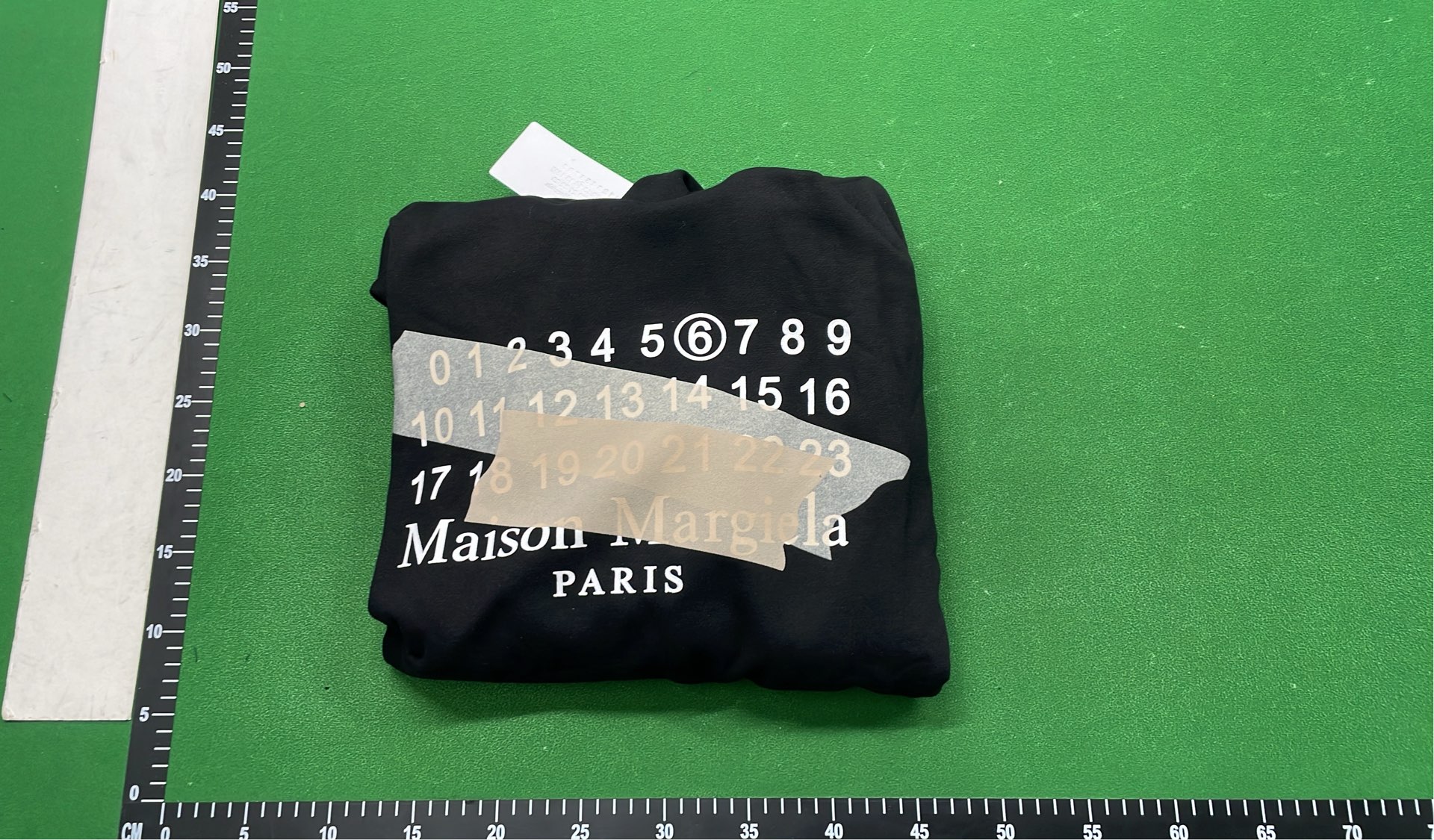Black Hoodie with Number Pattern Design