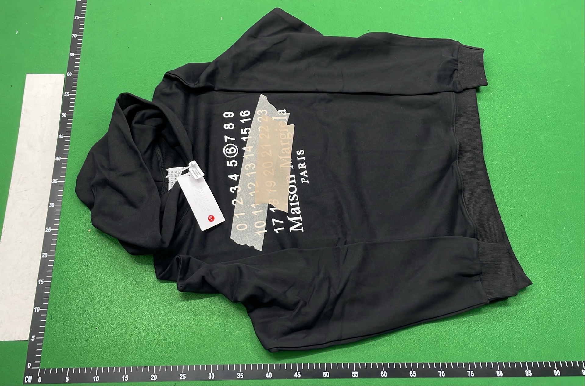 Black Hoodie with Number Pattern Design
