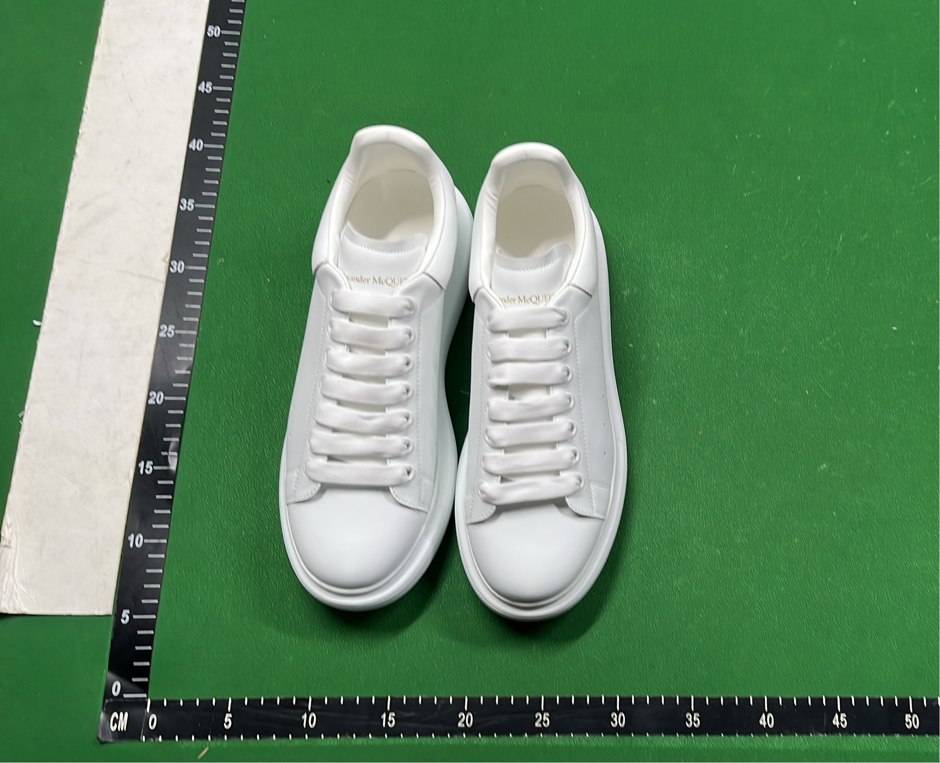 Alexander McQueen White Sneakers with Black Heel Tab
