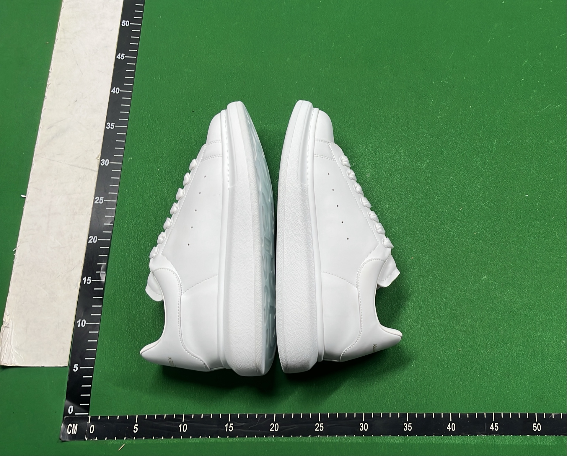 Alexander McQueen White Sneakers with Black Heel Tab
