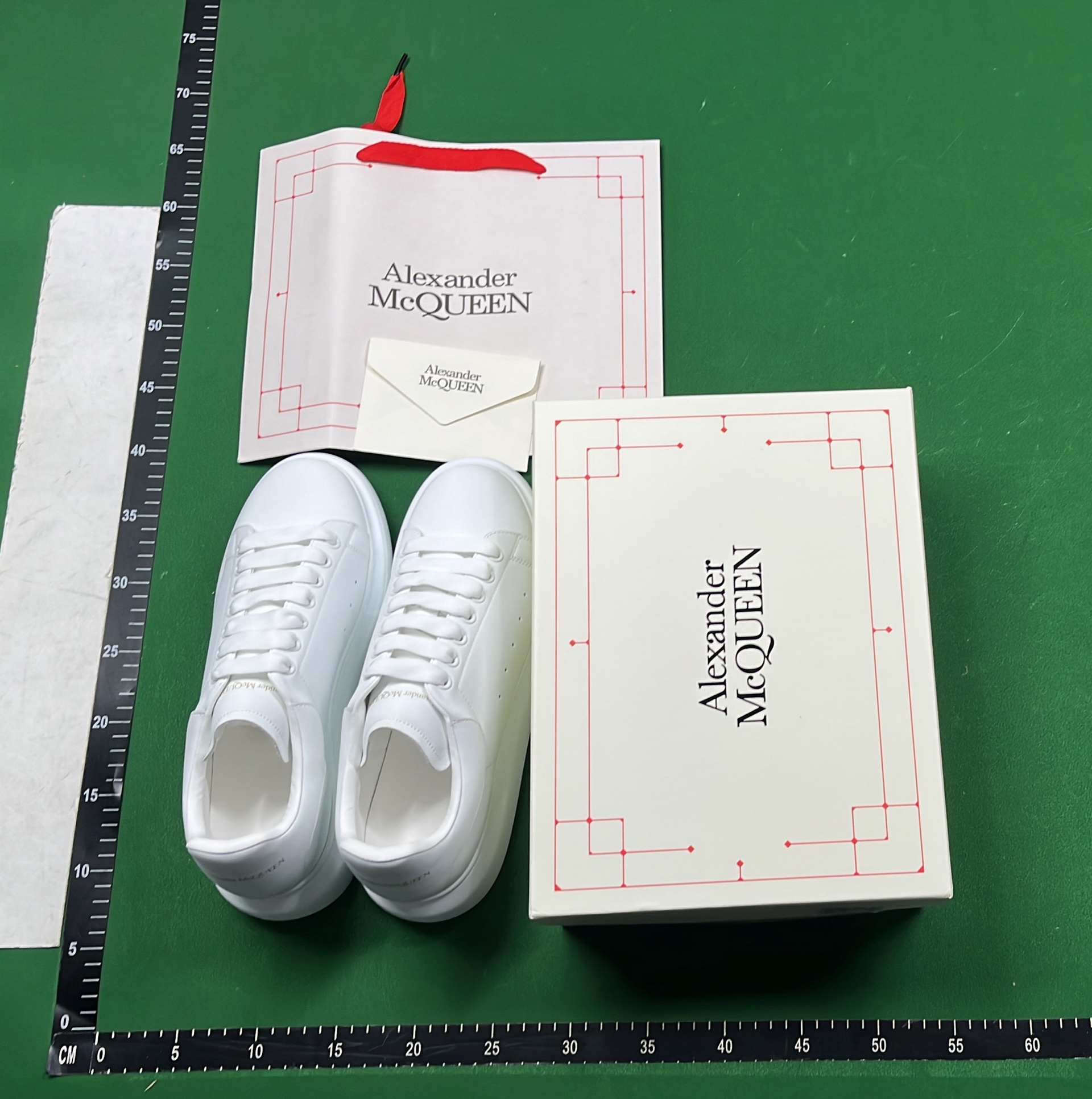 Alexander McQueen White Sneakers with Black Heel Tab