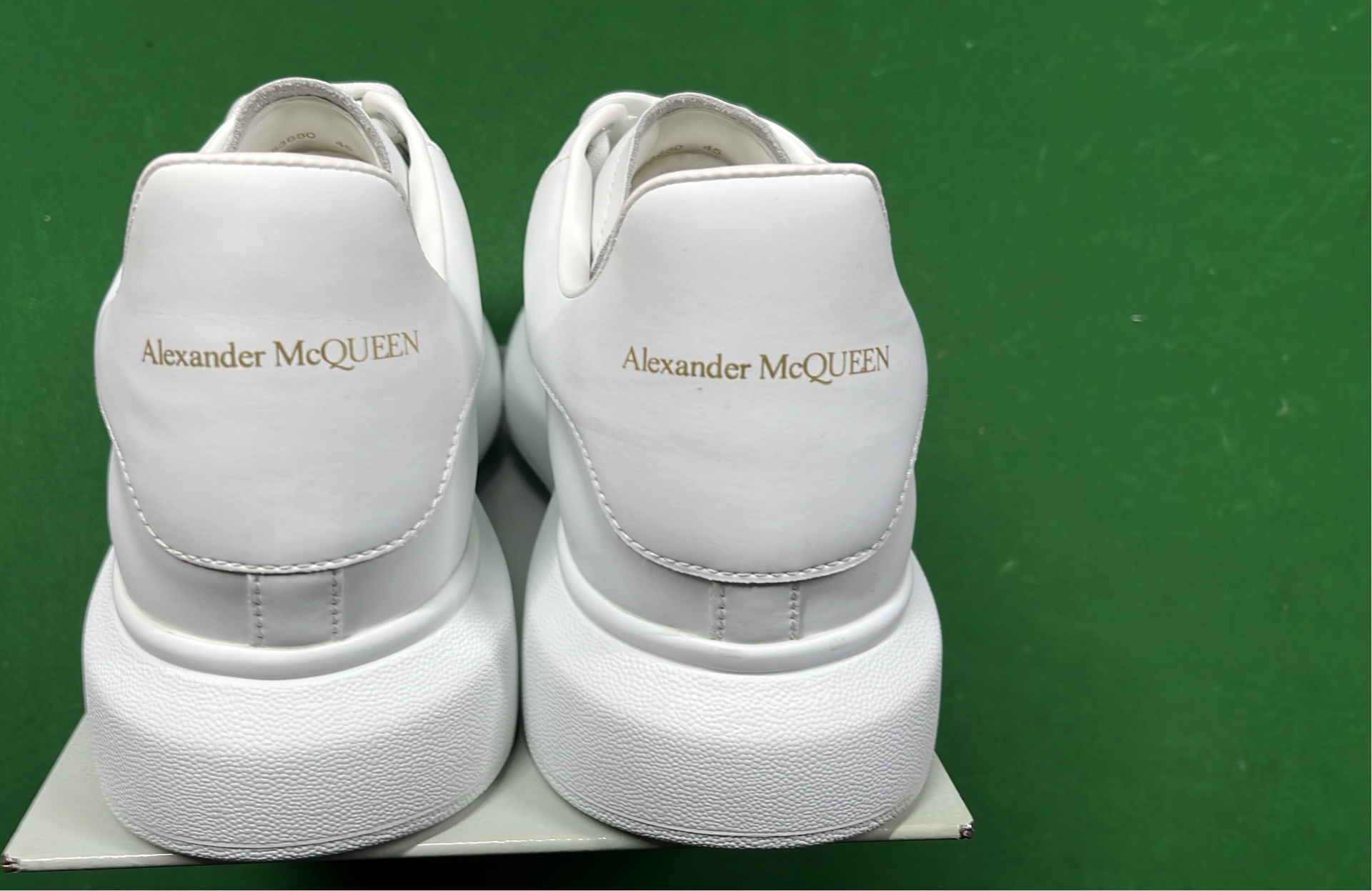 Alexander McQueen White Sneakers with Black Heel Tab