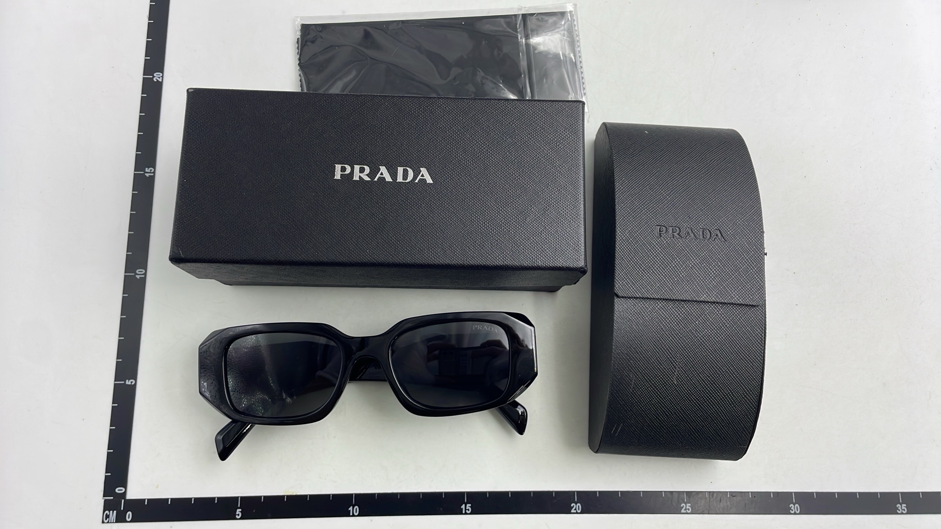 Prada Sunglasses with Square Frame and Gradient Lenses