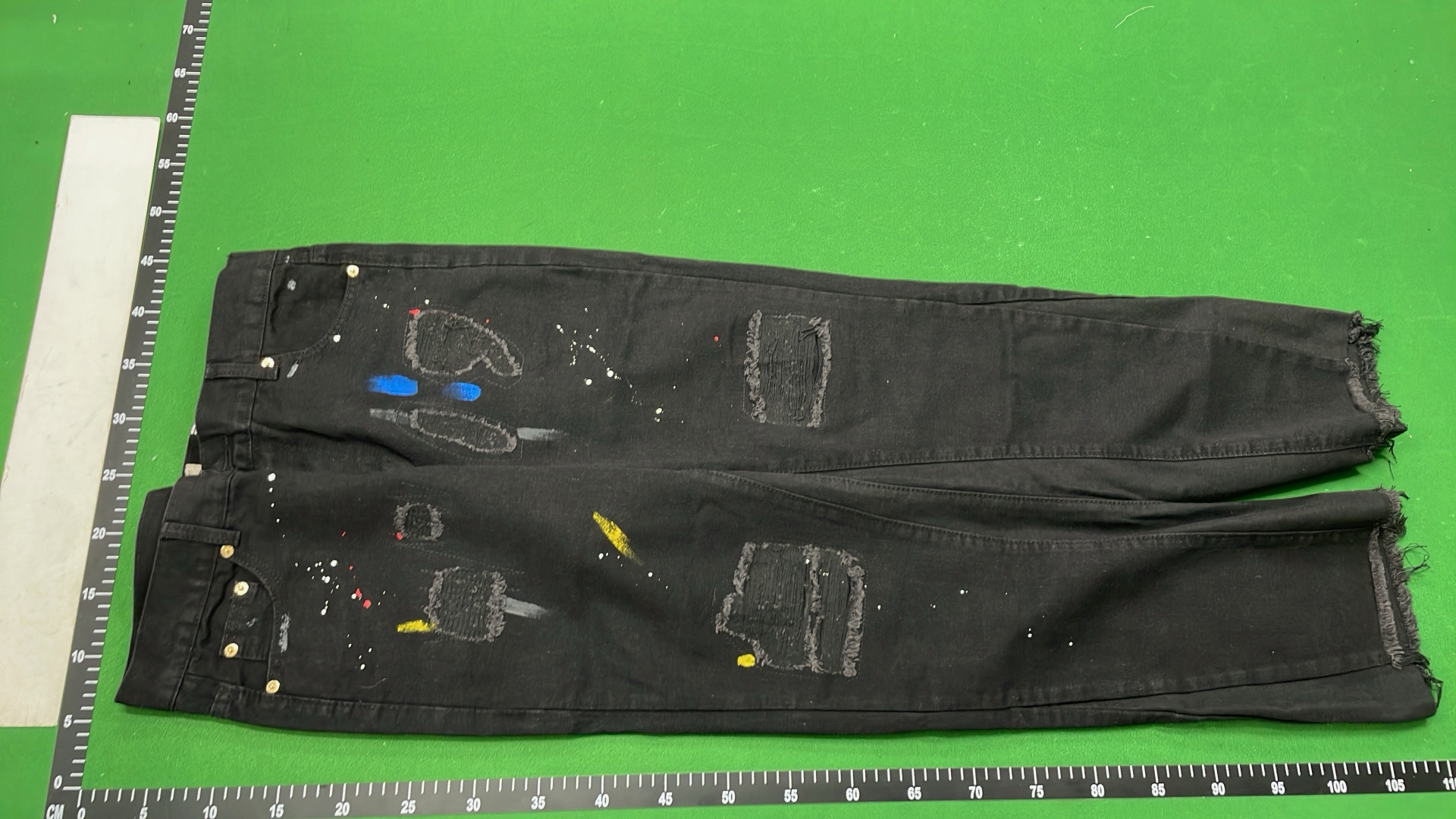 Black Distressed Denim Jeans with Embroidery and Frayed Hem