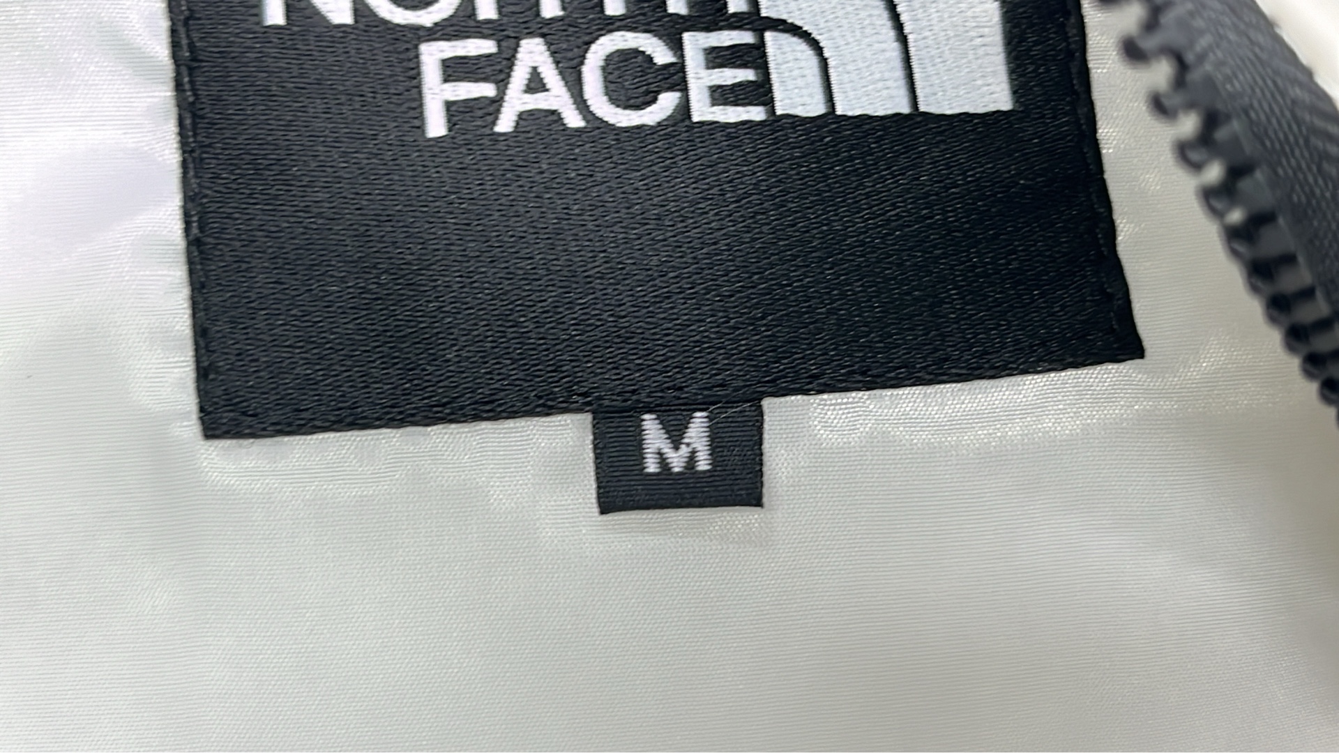 The North Face XX Logo Down Vest - Black and White