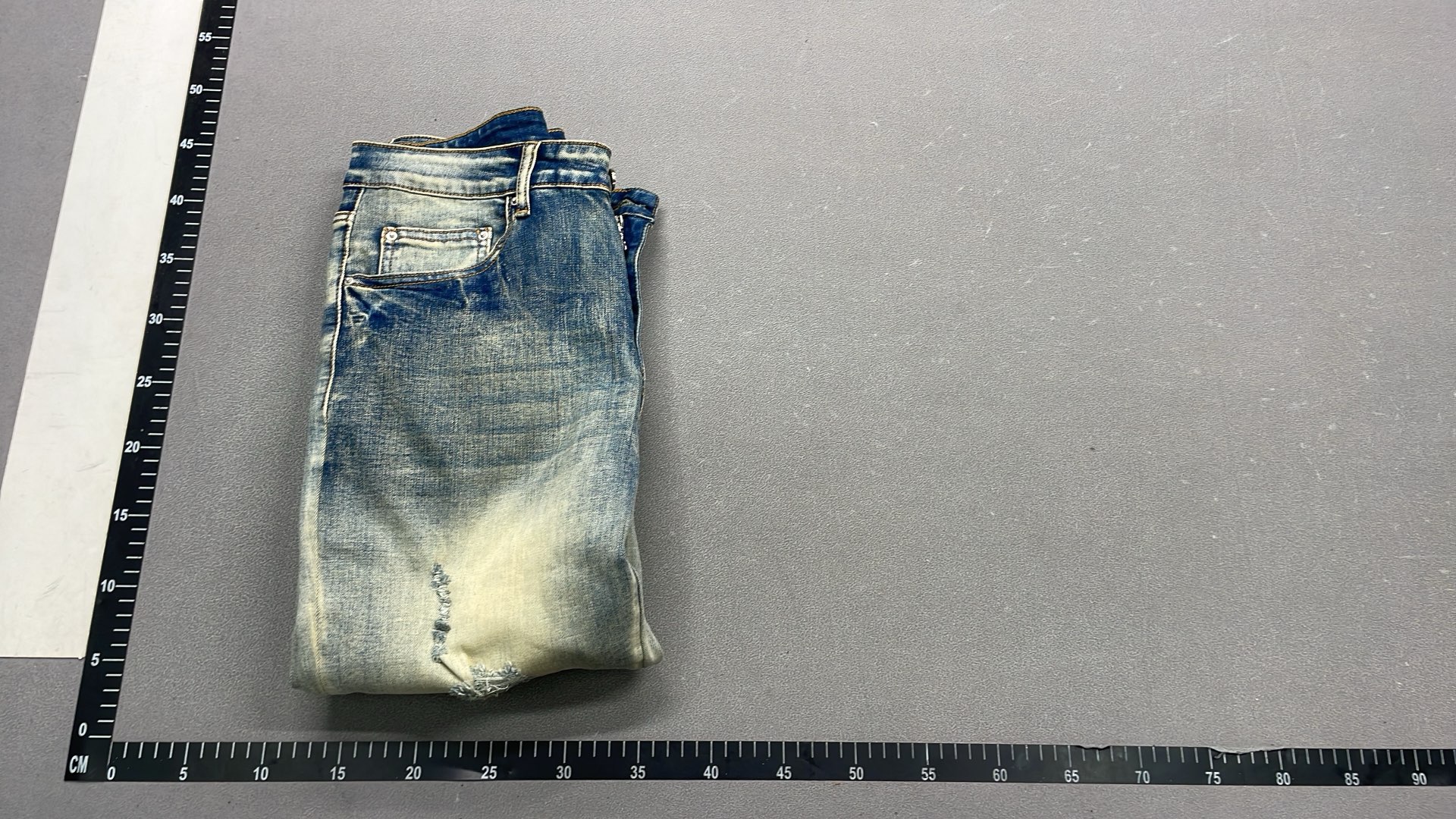 Men's Black Distressed Denim Jeans with Colorful Paint Drip Design