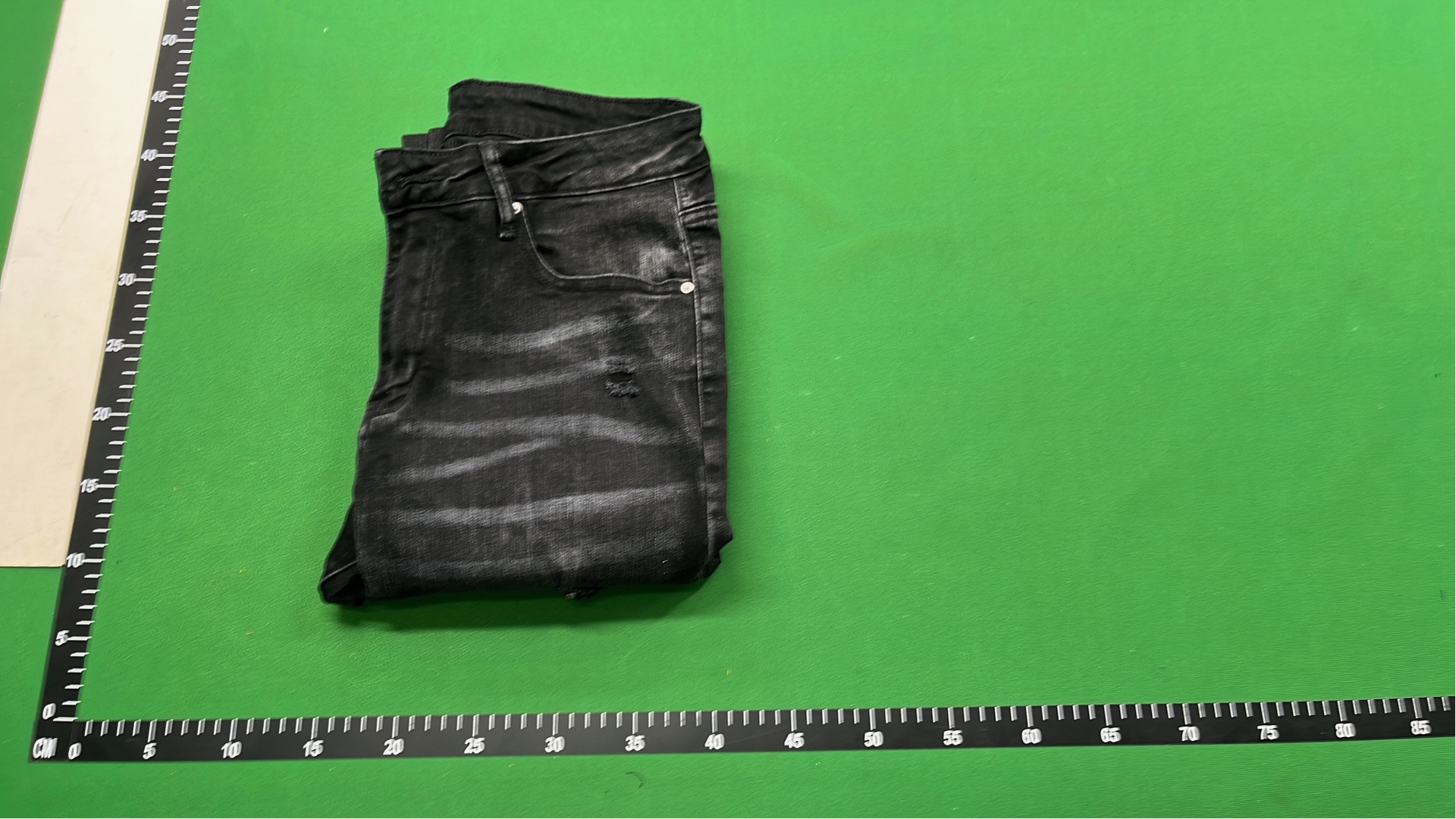 Men's Black Distressed Denim Jeans with Colorful Paint Drip Design