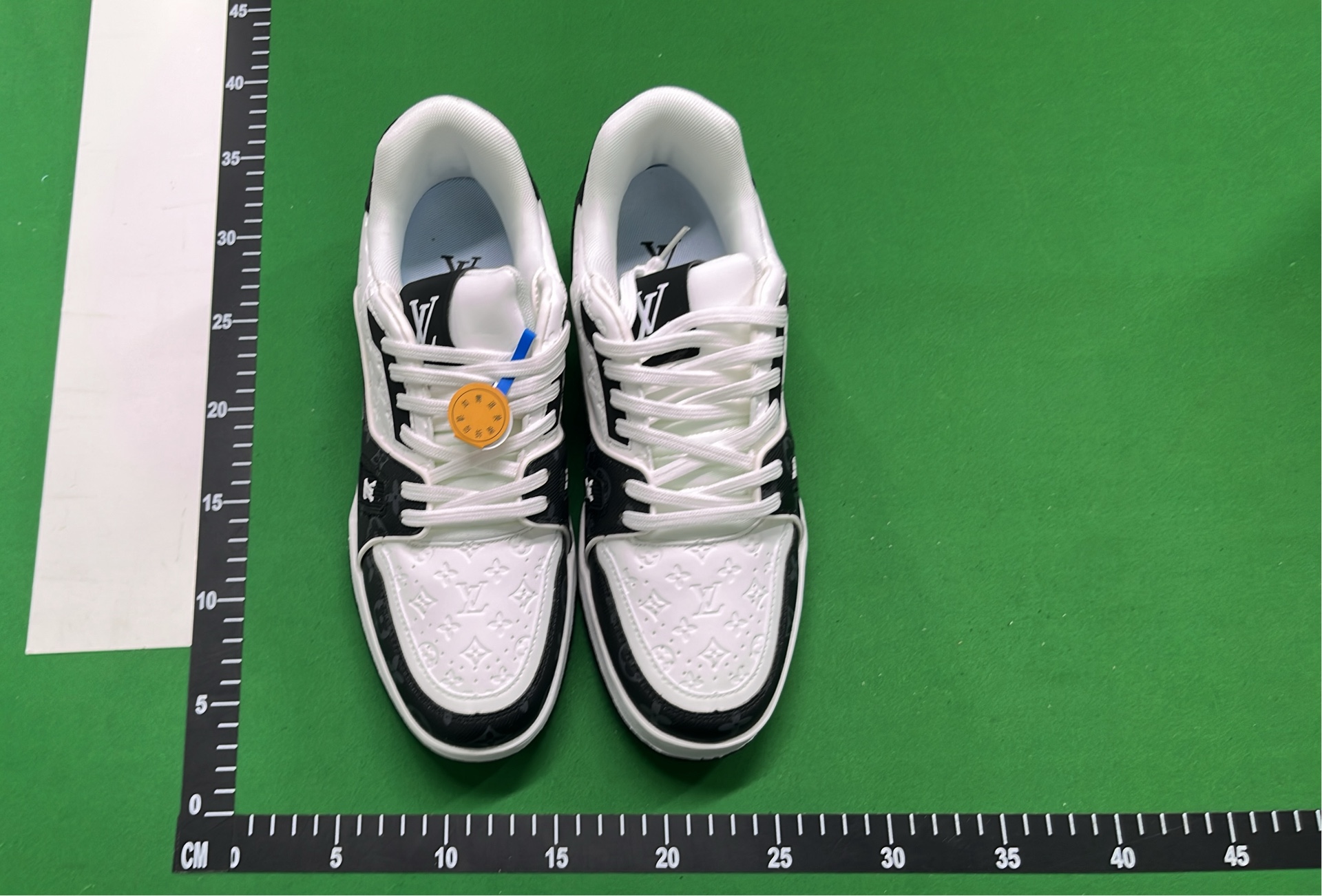 Louis Vuitton White and Black Sneakers with LV Logo