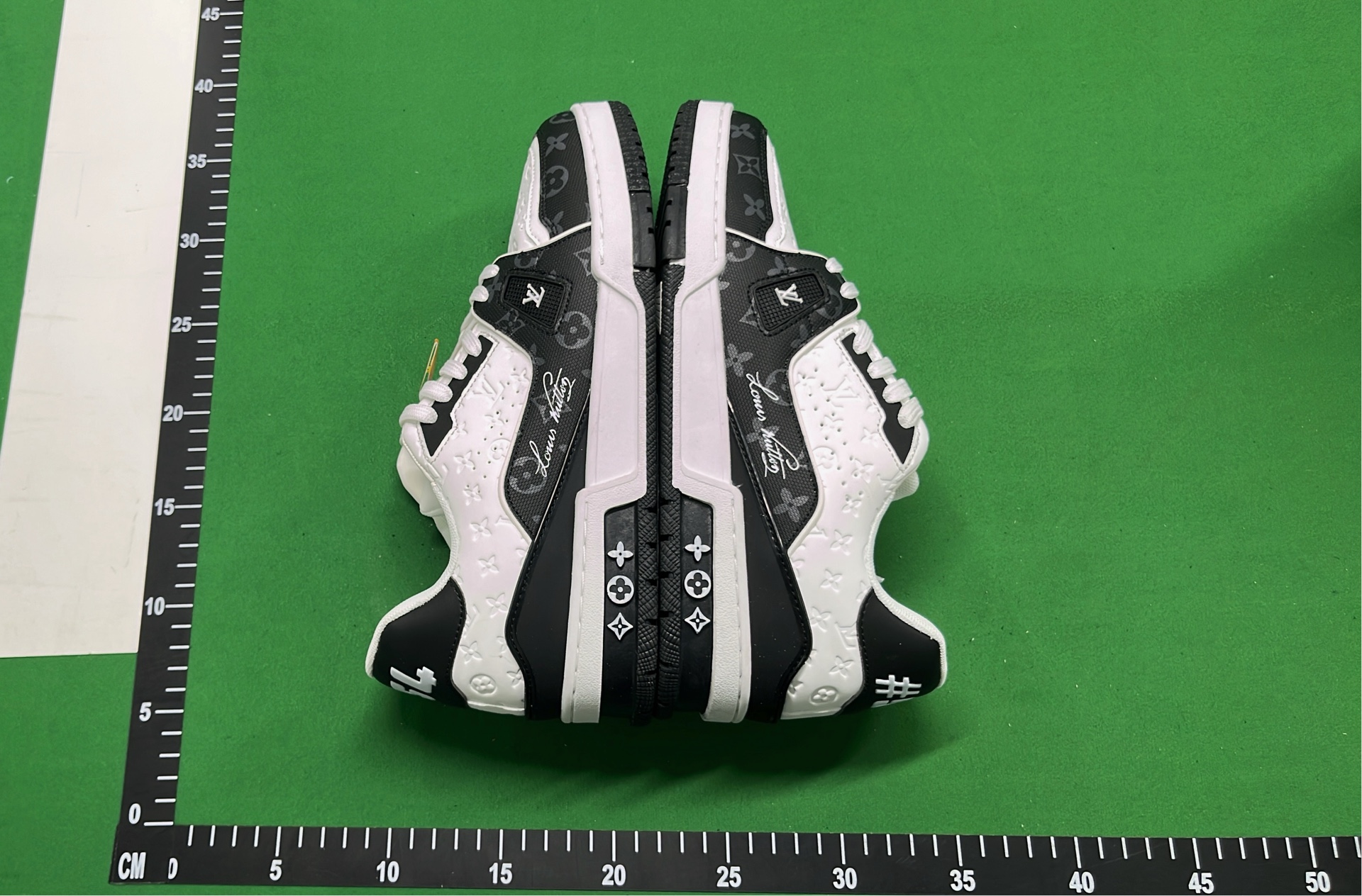 Louis Vuitton White and Black Sneakers with LV Logo