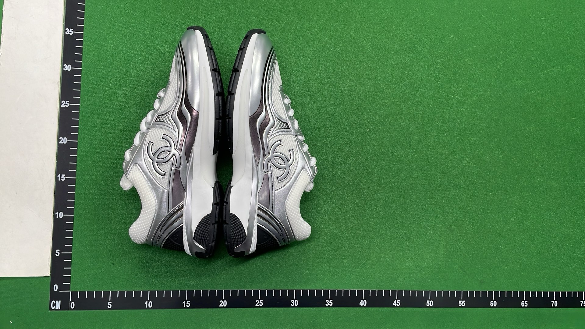 Chanel Silver Sneakers with CC Logo - Luxury Fashion Shoes