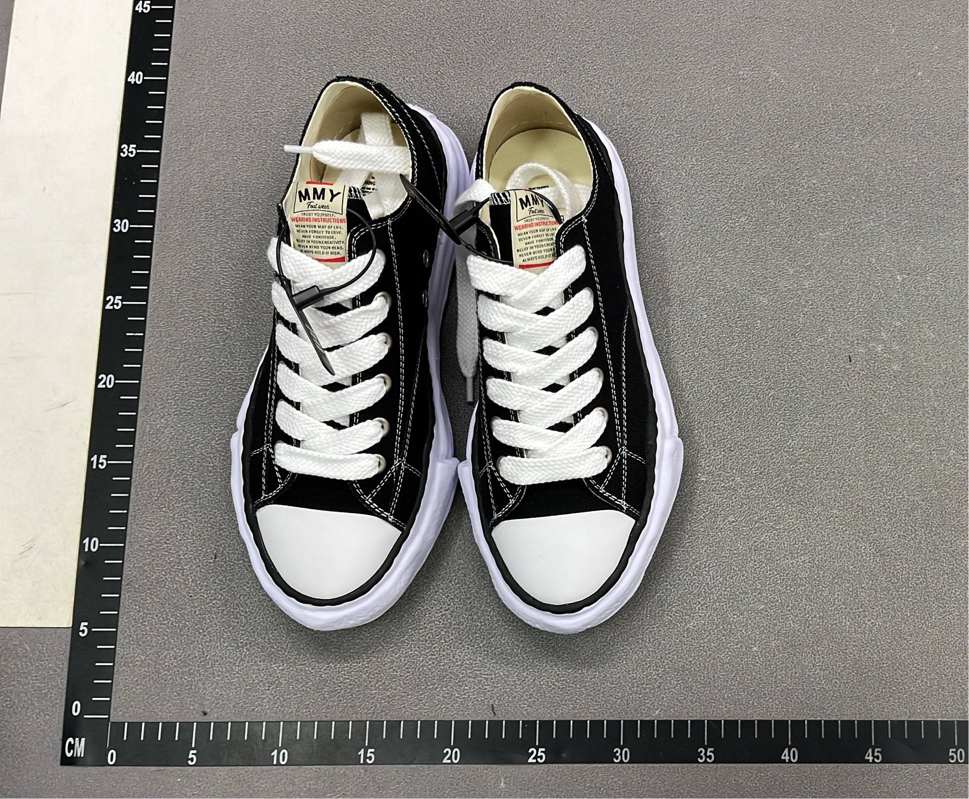 MMY Black and White Distressed Sneakers