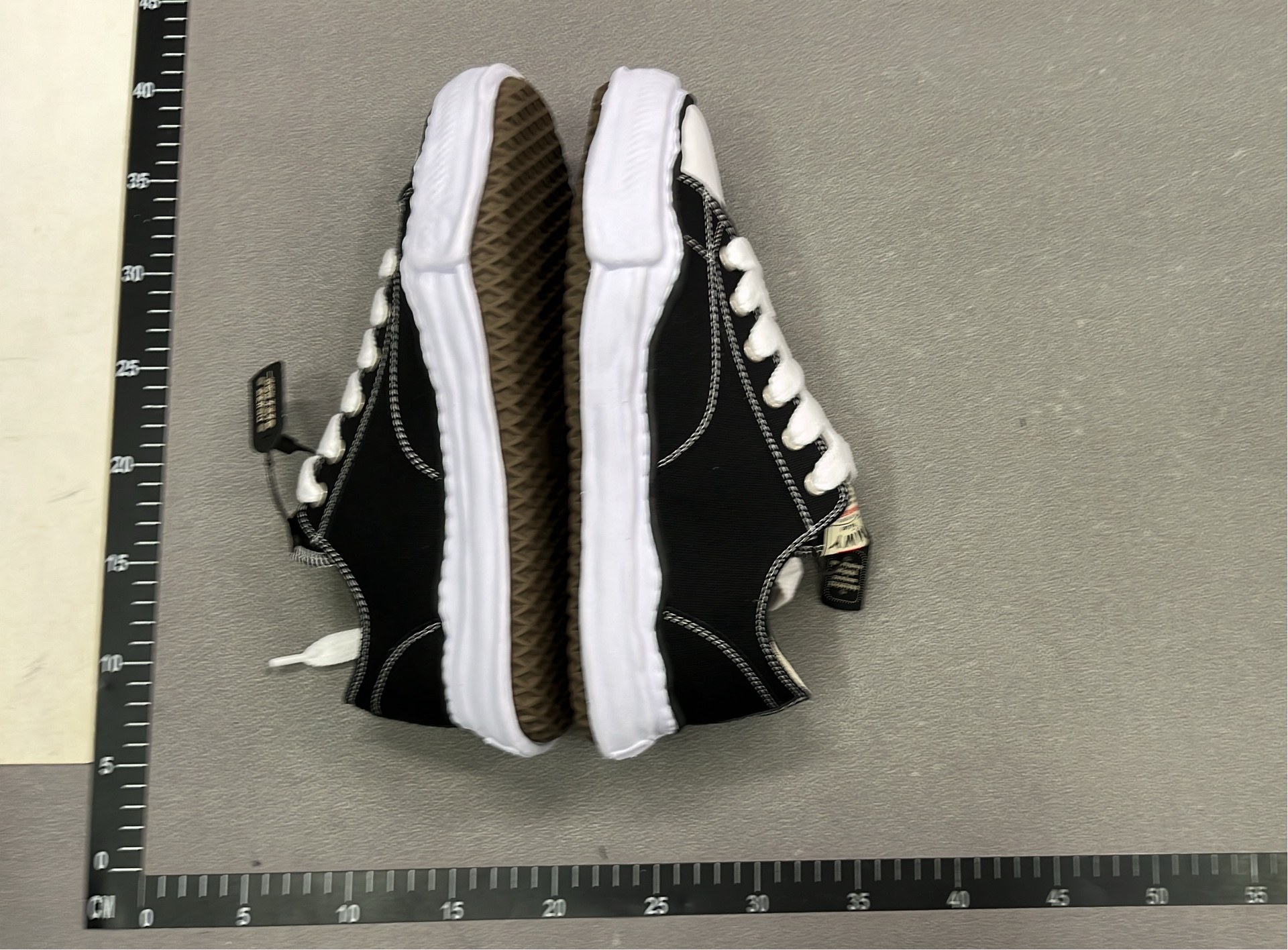 MMY Black and White Distressed Sneakers