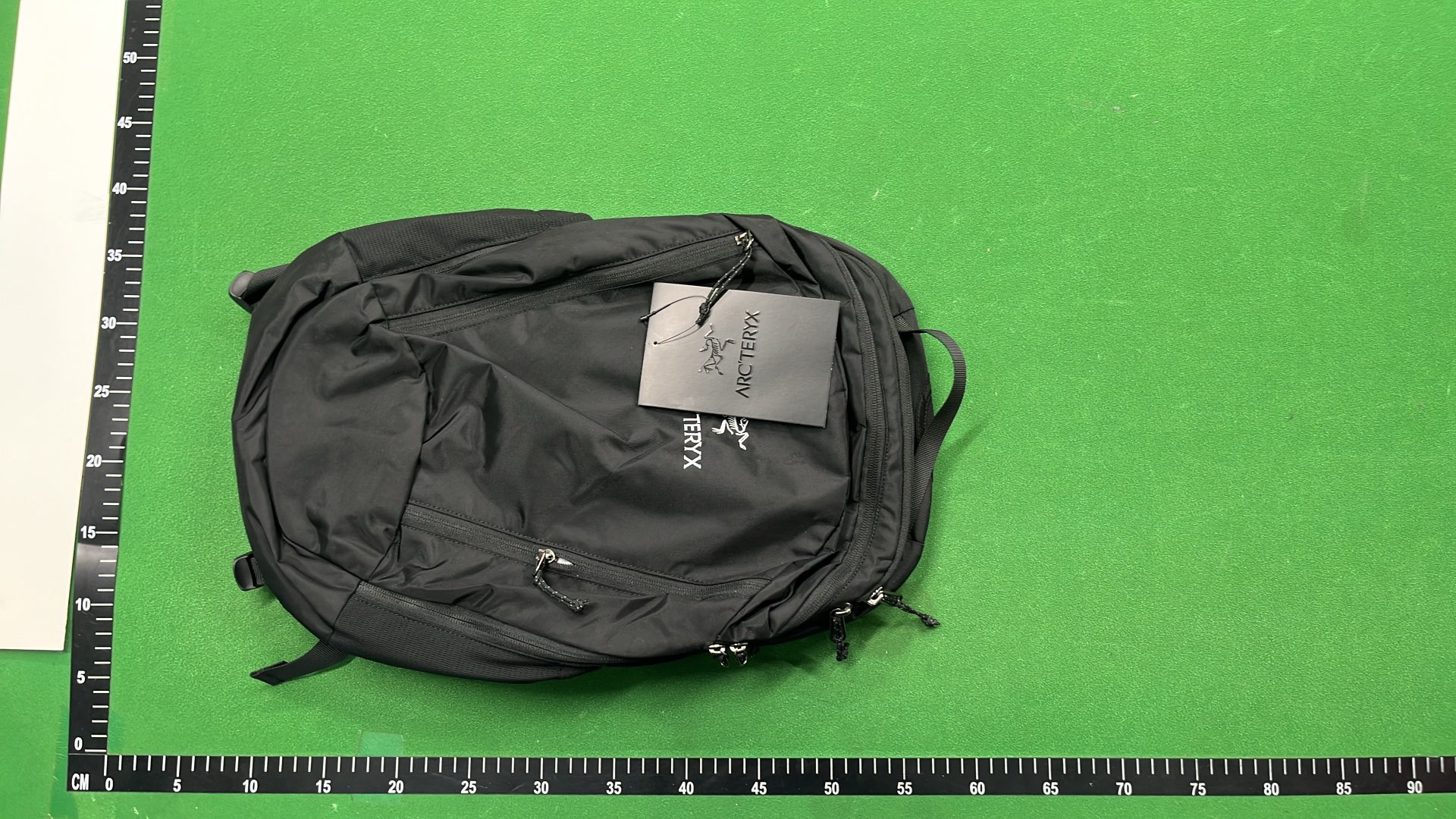 Arc'teryx Black Backpack with Yellow Logo