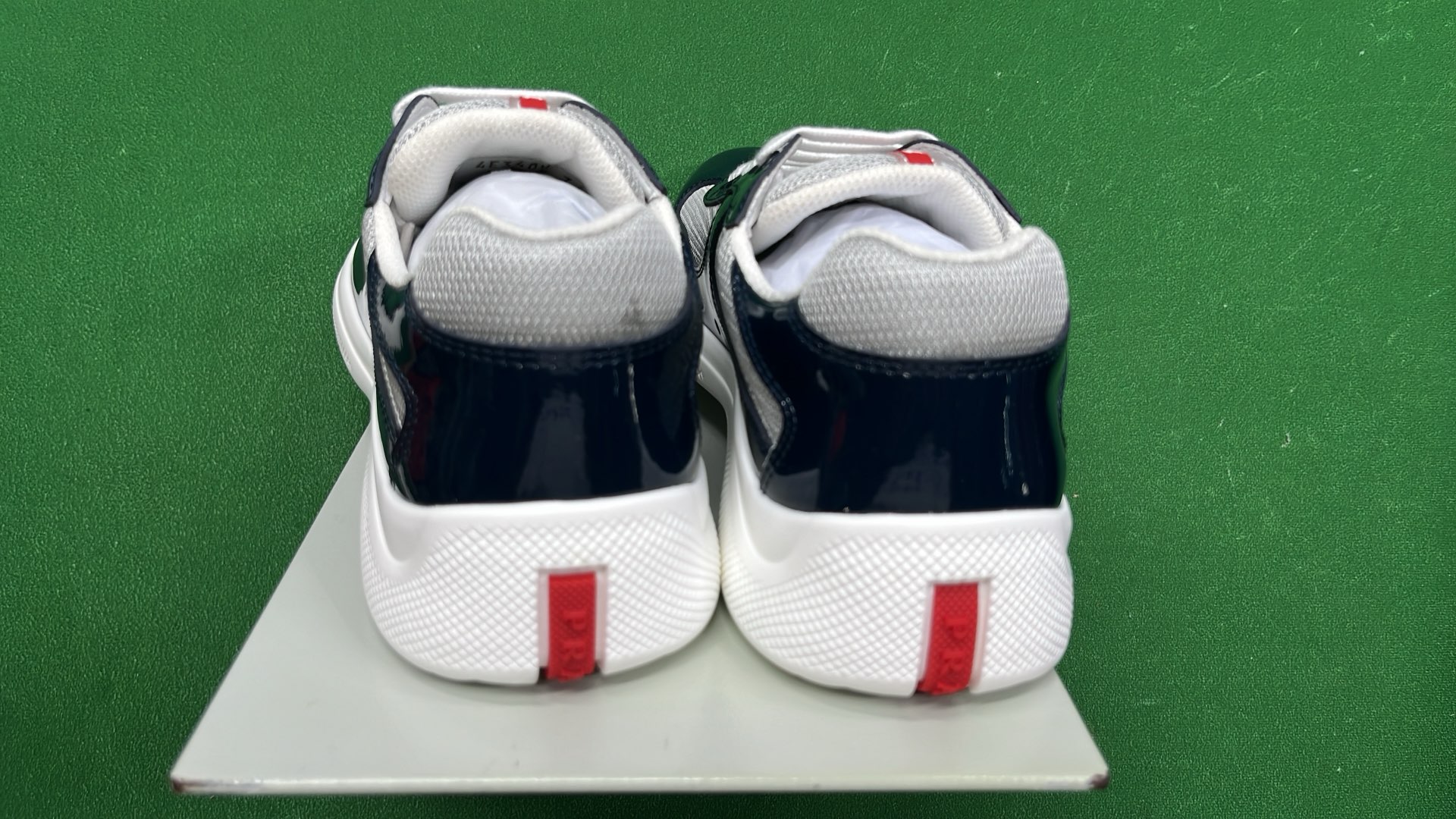 Grey Patent Leather Sneakers with White Sole and Red Heel