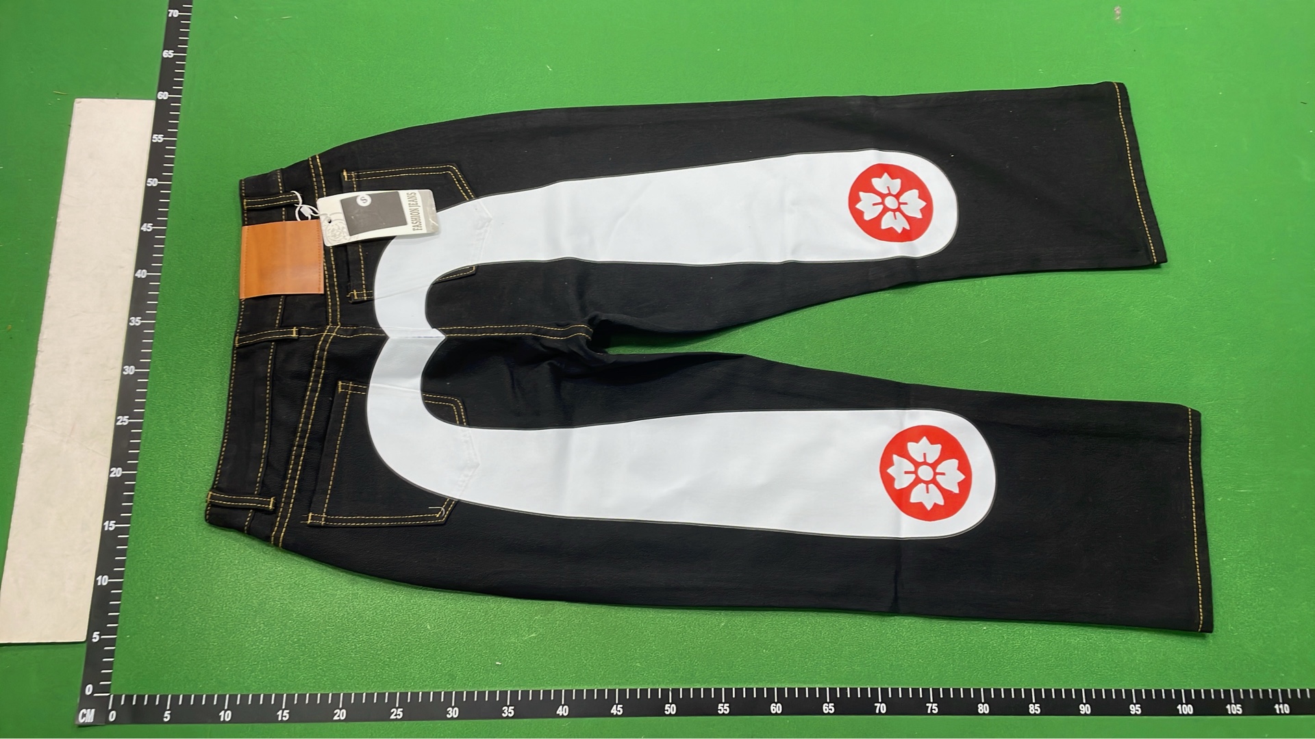 UNIQLO Denim Pants with Unique Artistic Designs