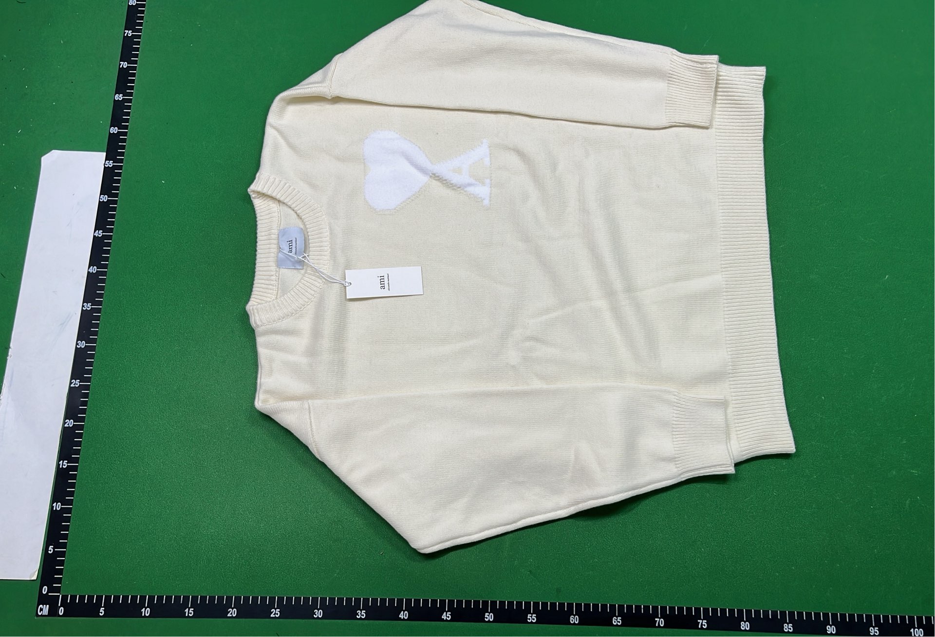 Black Sweater with Red Heart Logo