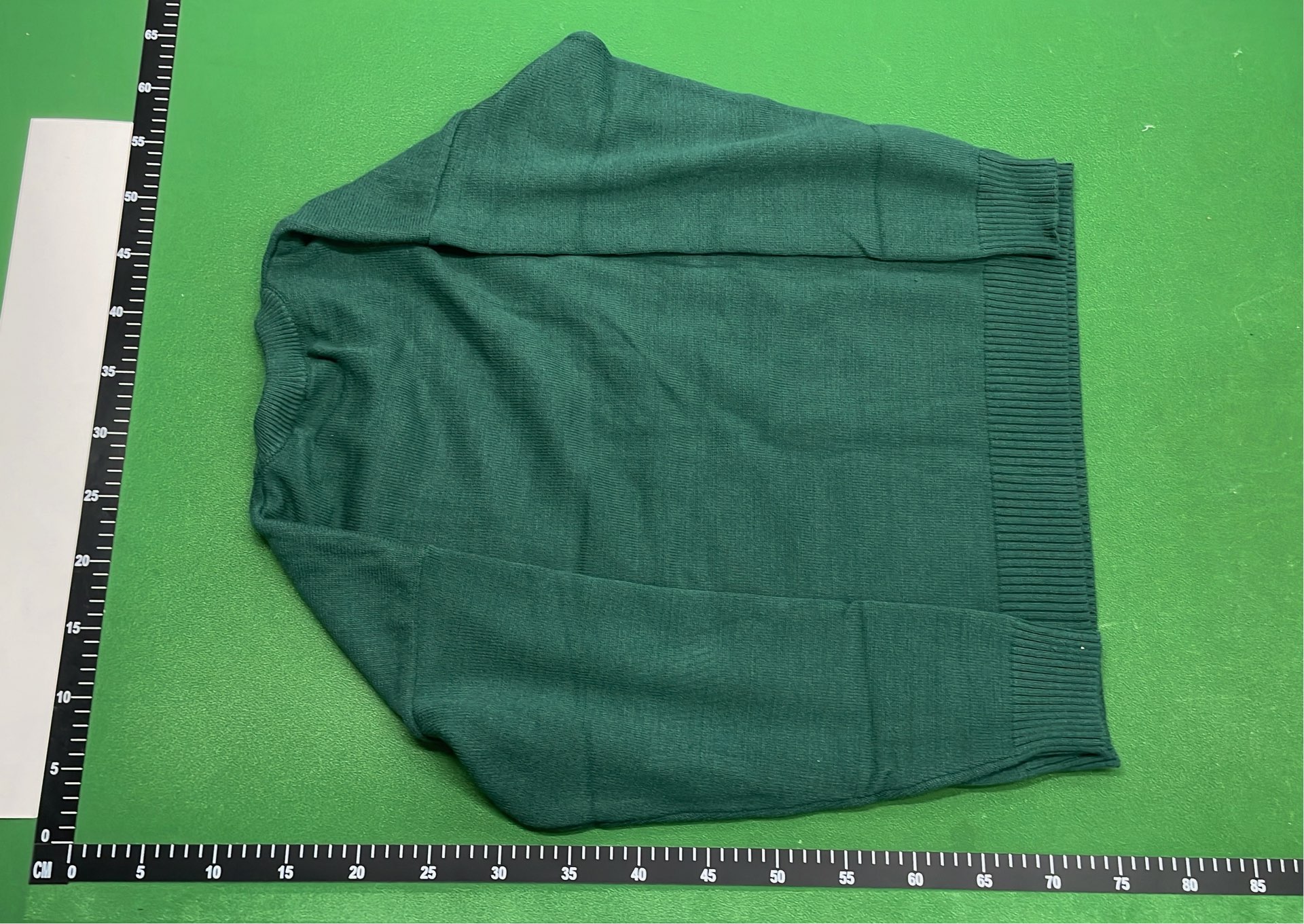 Black Sweater with Red Heart Logo