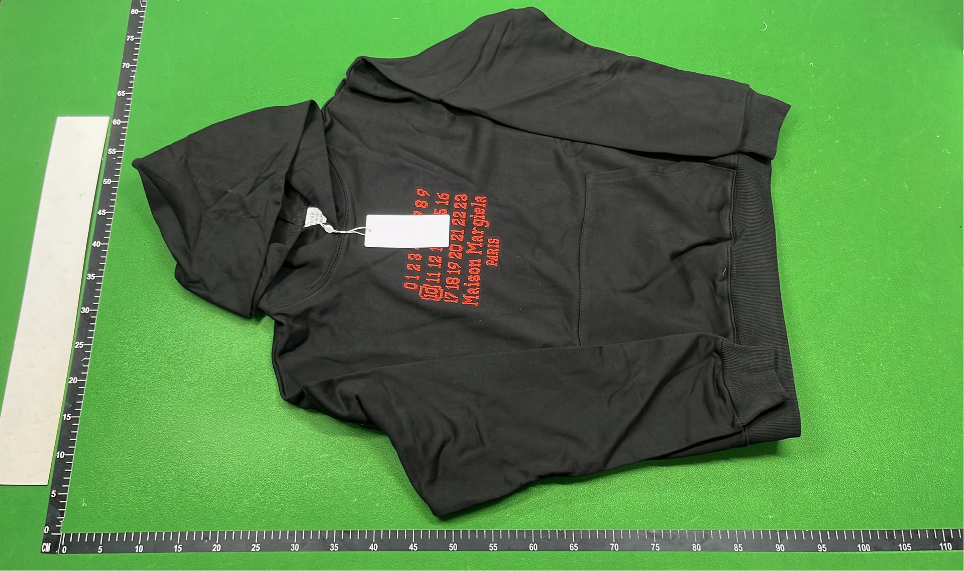 Black Hoodie with Number Pattern Design