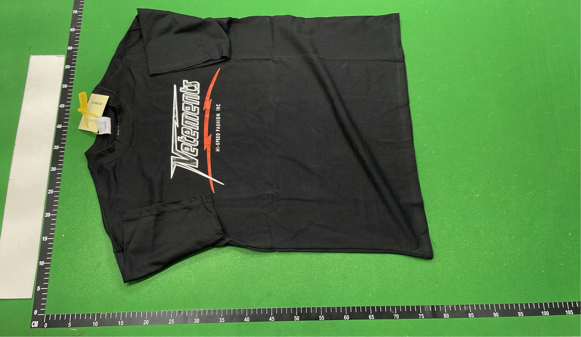 Black T-Shirt with 'The Earth Is Flat' Print - Streetwear Style