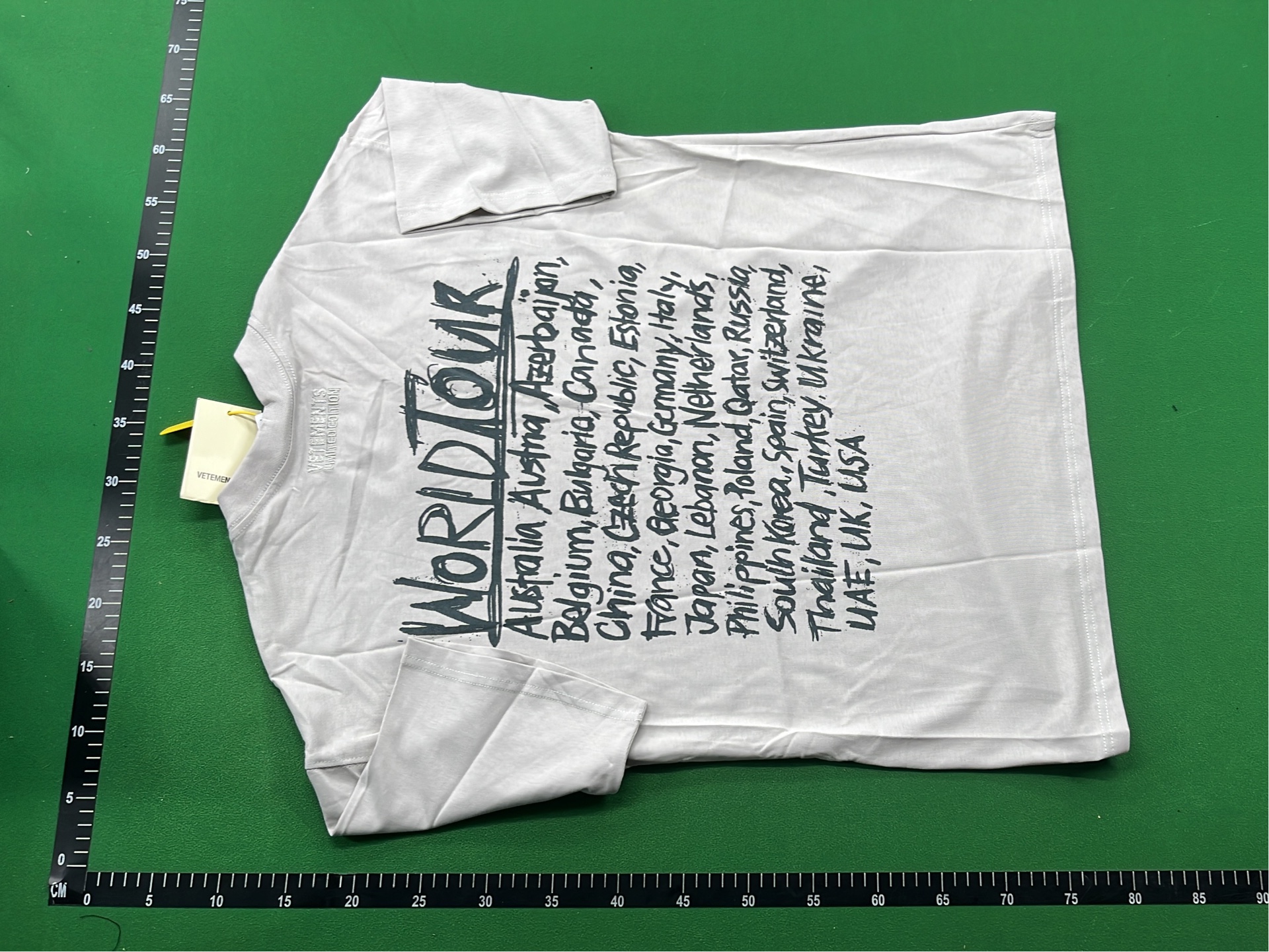 Black T-Shirt with 'The Earth Is Flat' Print - Streetwear Style