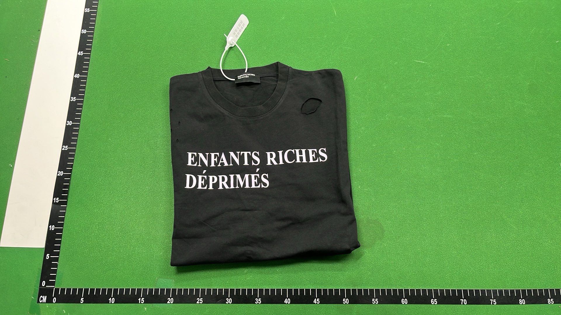 ERD Distressed T-Shirt with Bold Text Design