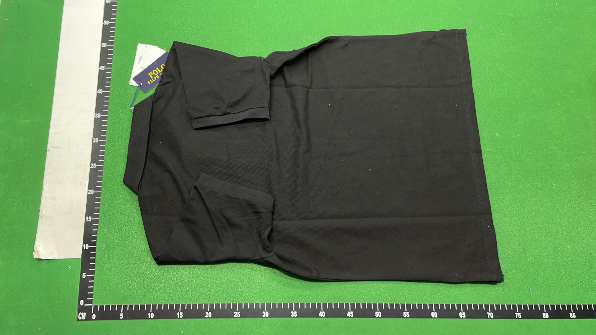 Black Polo Shirt with Gold Pony Logo
