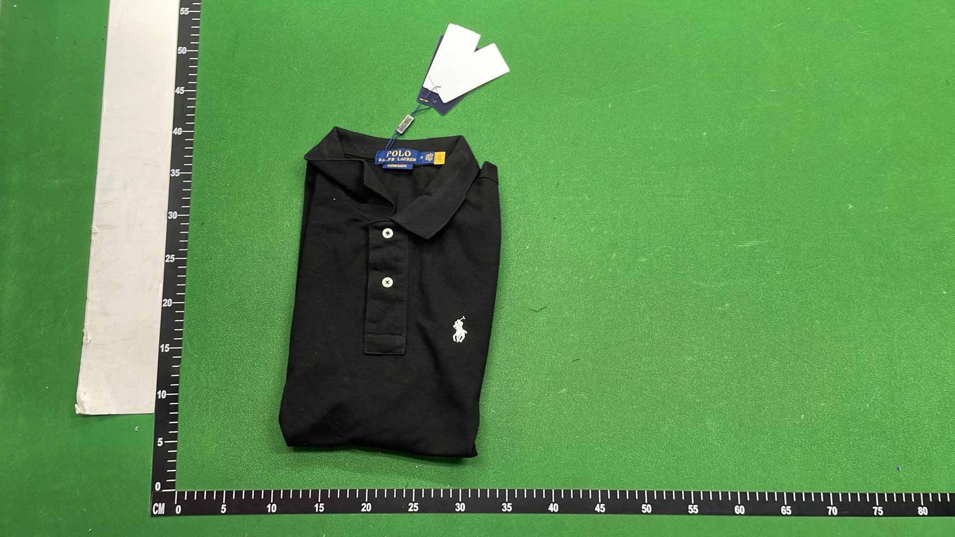 Black Polo Shirt with Gold Pony Logo