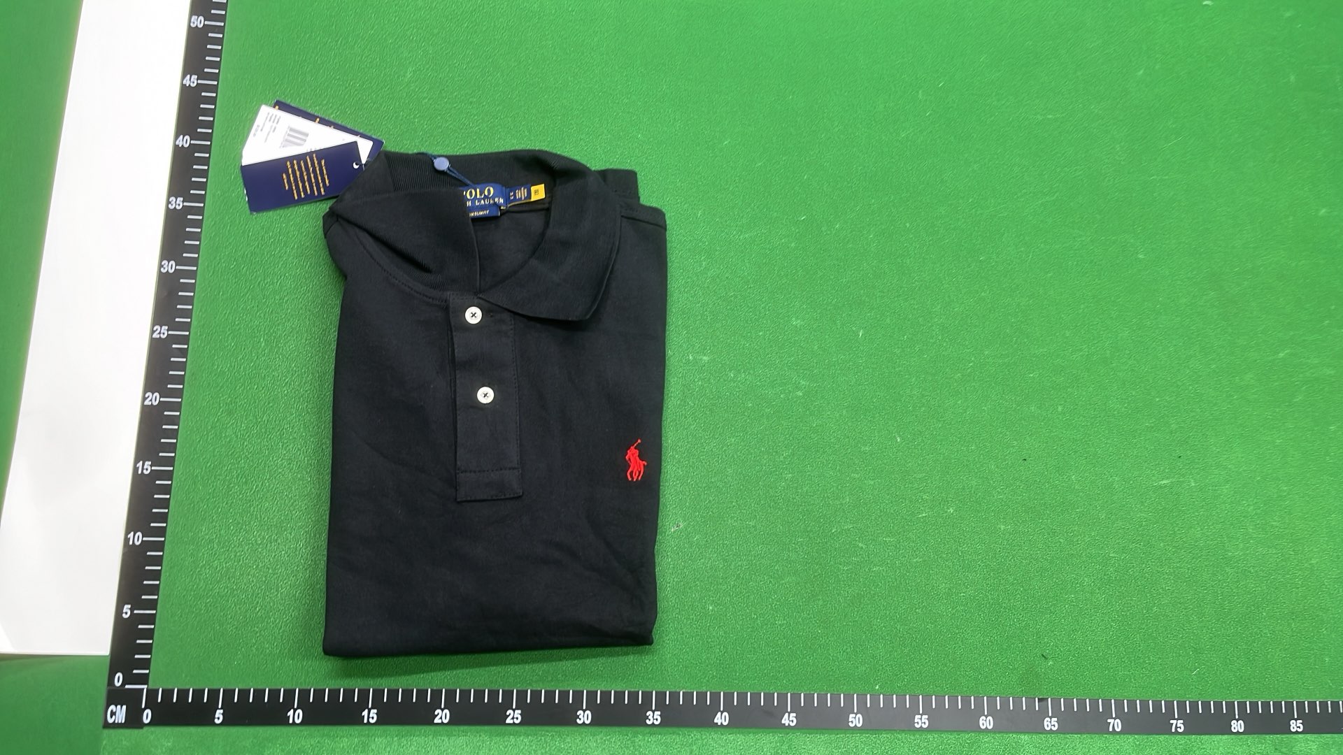 Black Polo Shirt with Gold Pony Logo