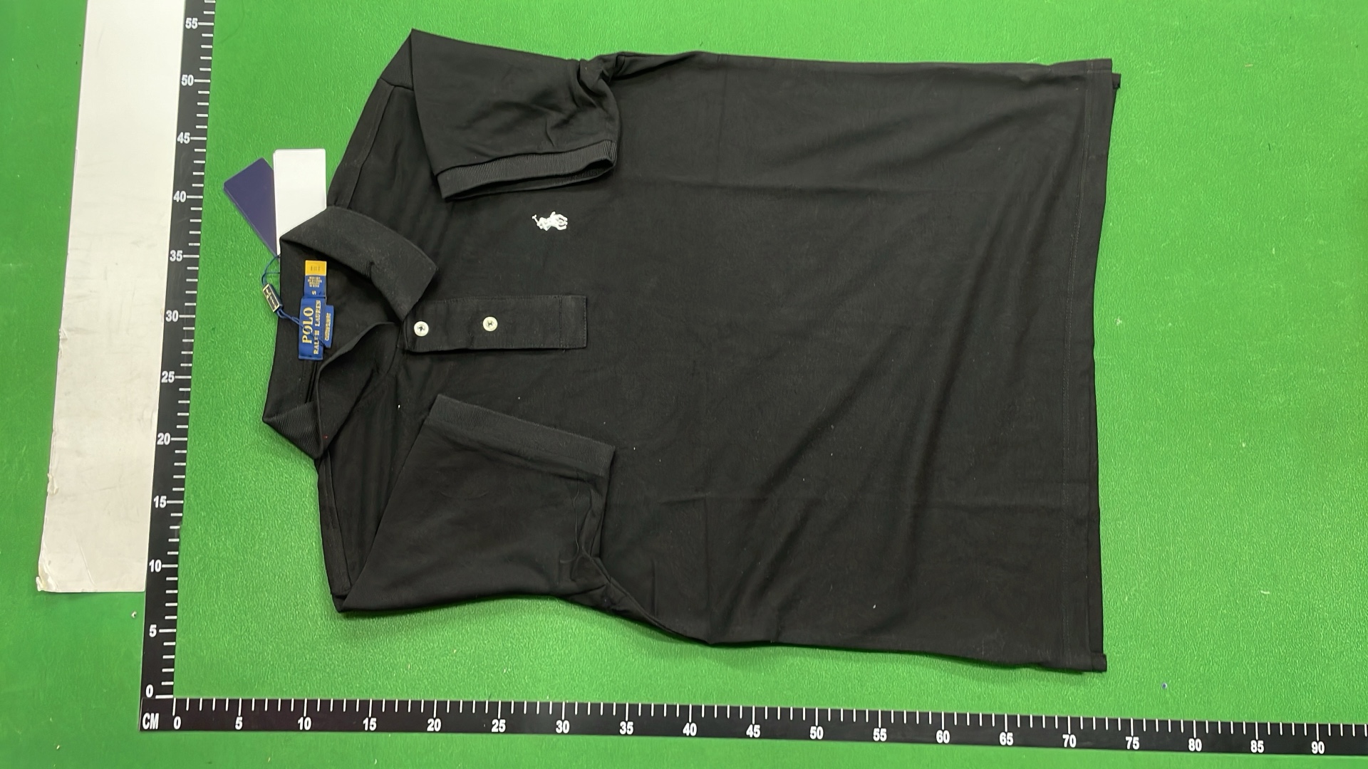 Black Polo Shirt with Gold Pony Logo