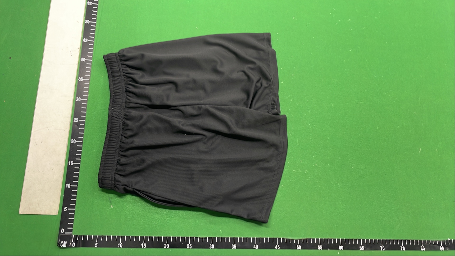 Vibrant Green Mesh Shorts with Logo Design