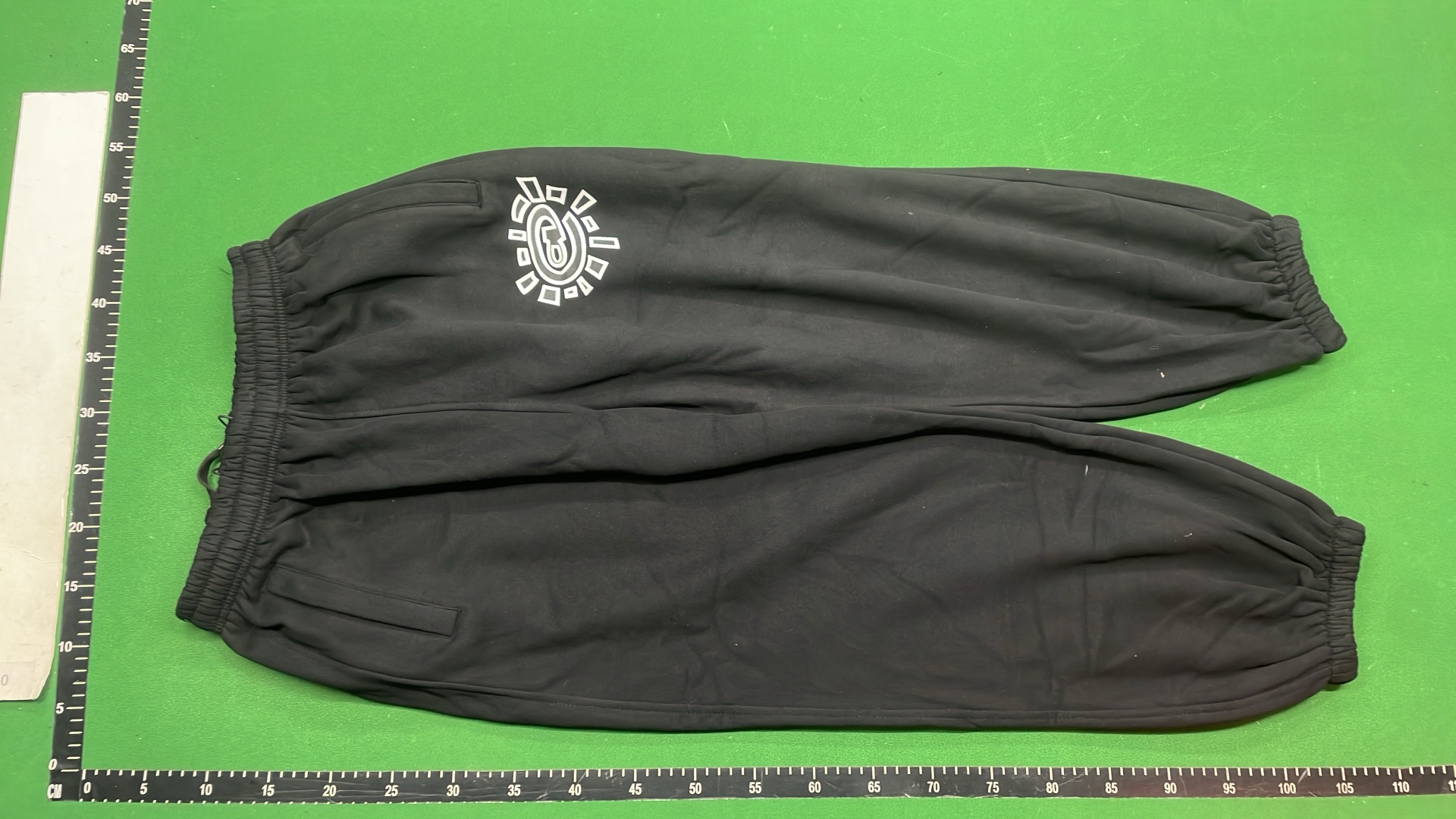 Black Hugo Sweatpants with Unique Logo Design