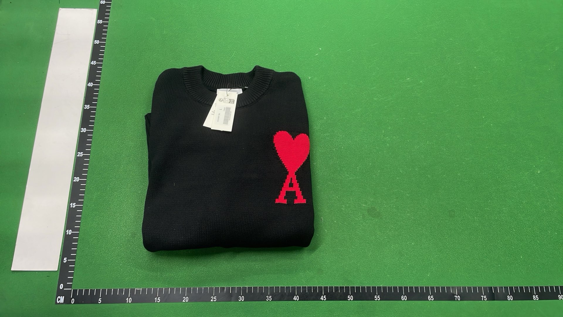 Black V-Neck Sweater with Red Heart and A Logo