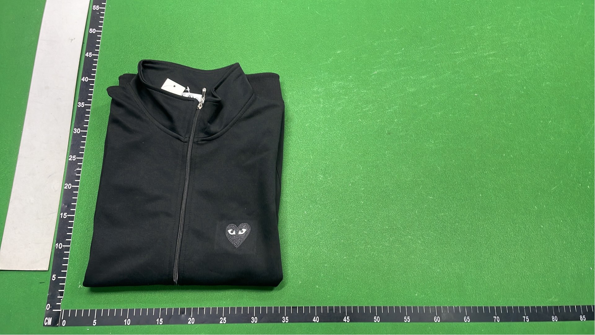 Black Hoodie with Heart Eyes Design - Front and Back View