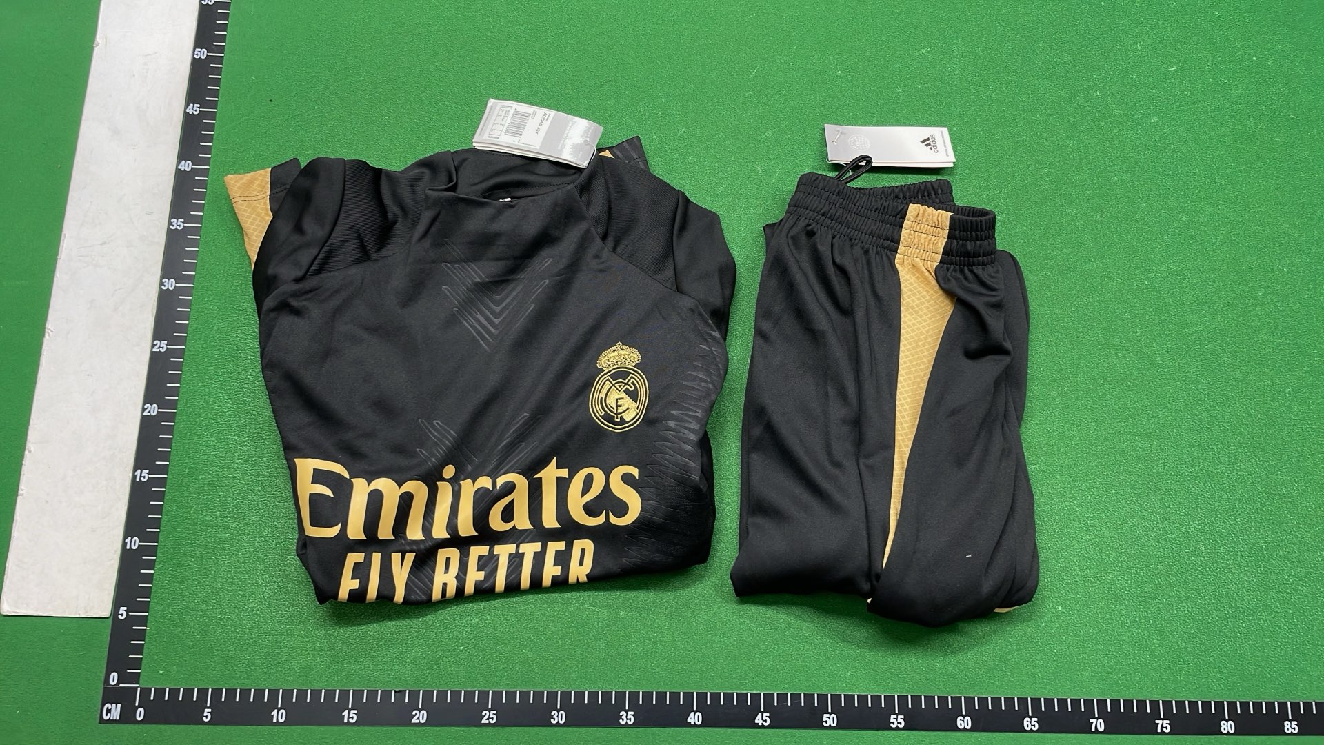 Real Madrid Black Training Kit with Gold Accents