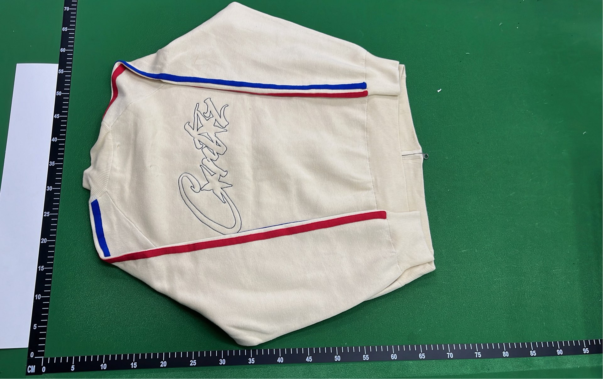 Cream Track Jacket with Red and Blue Stripes