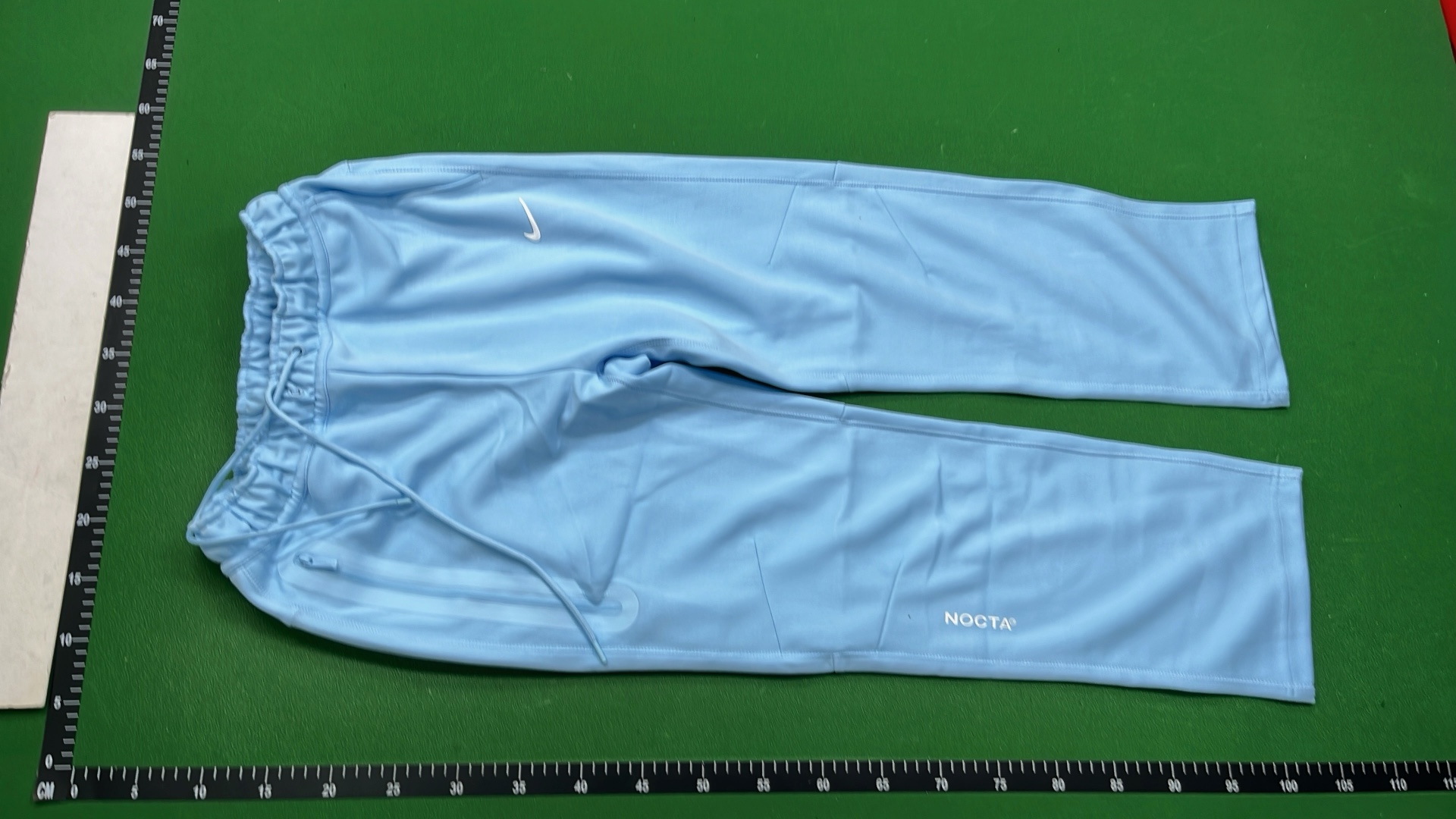 Nike Sportswear Pants in Green, Black, and White