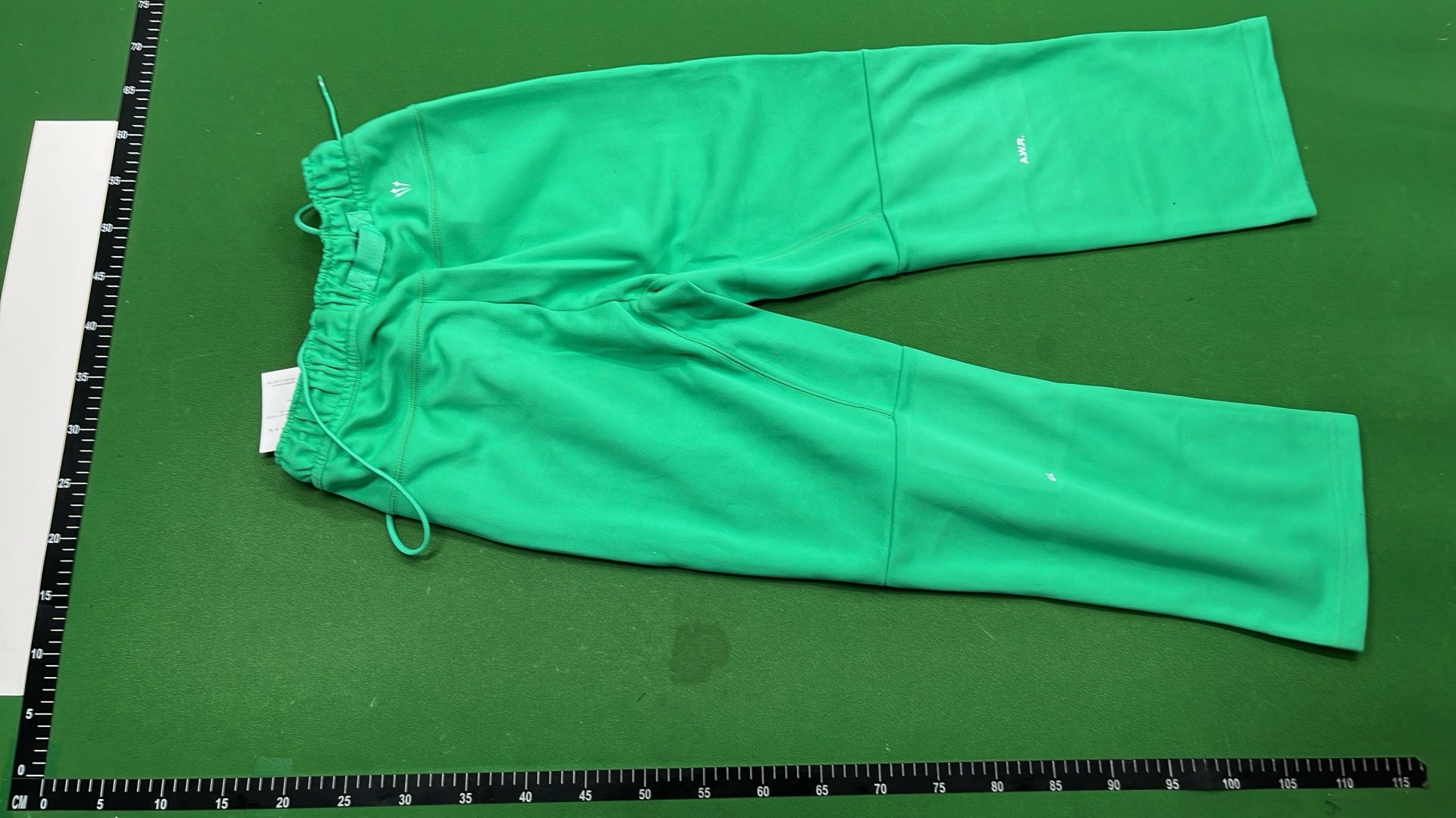 Nike Sportswear Pants in Green, Black, and White